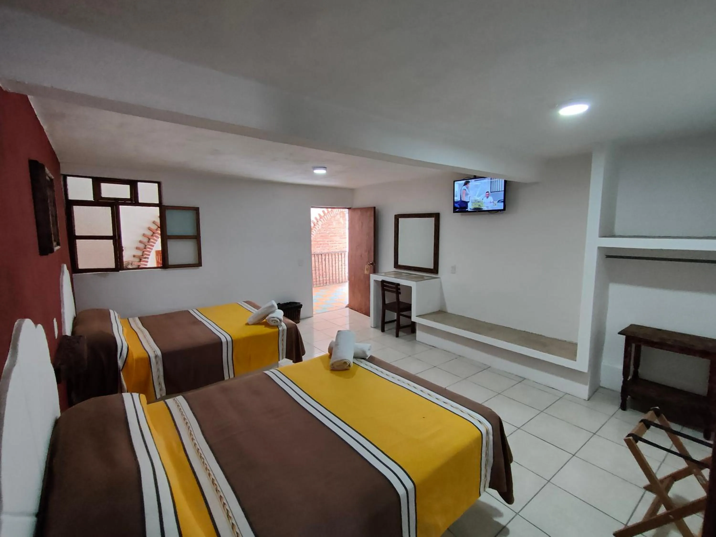 Bed in Hotel Hacienda Morales.