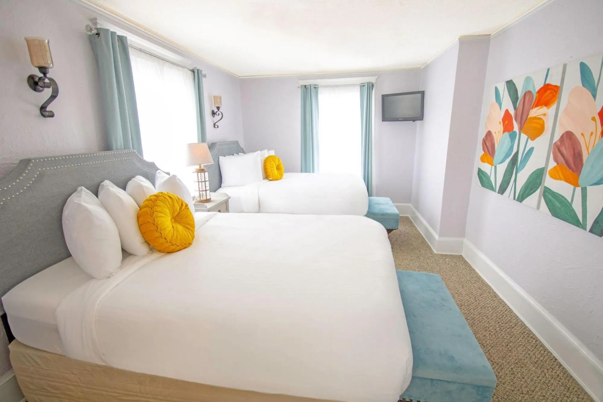 Bed in Inn on Charlotte Boutique Hotel