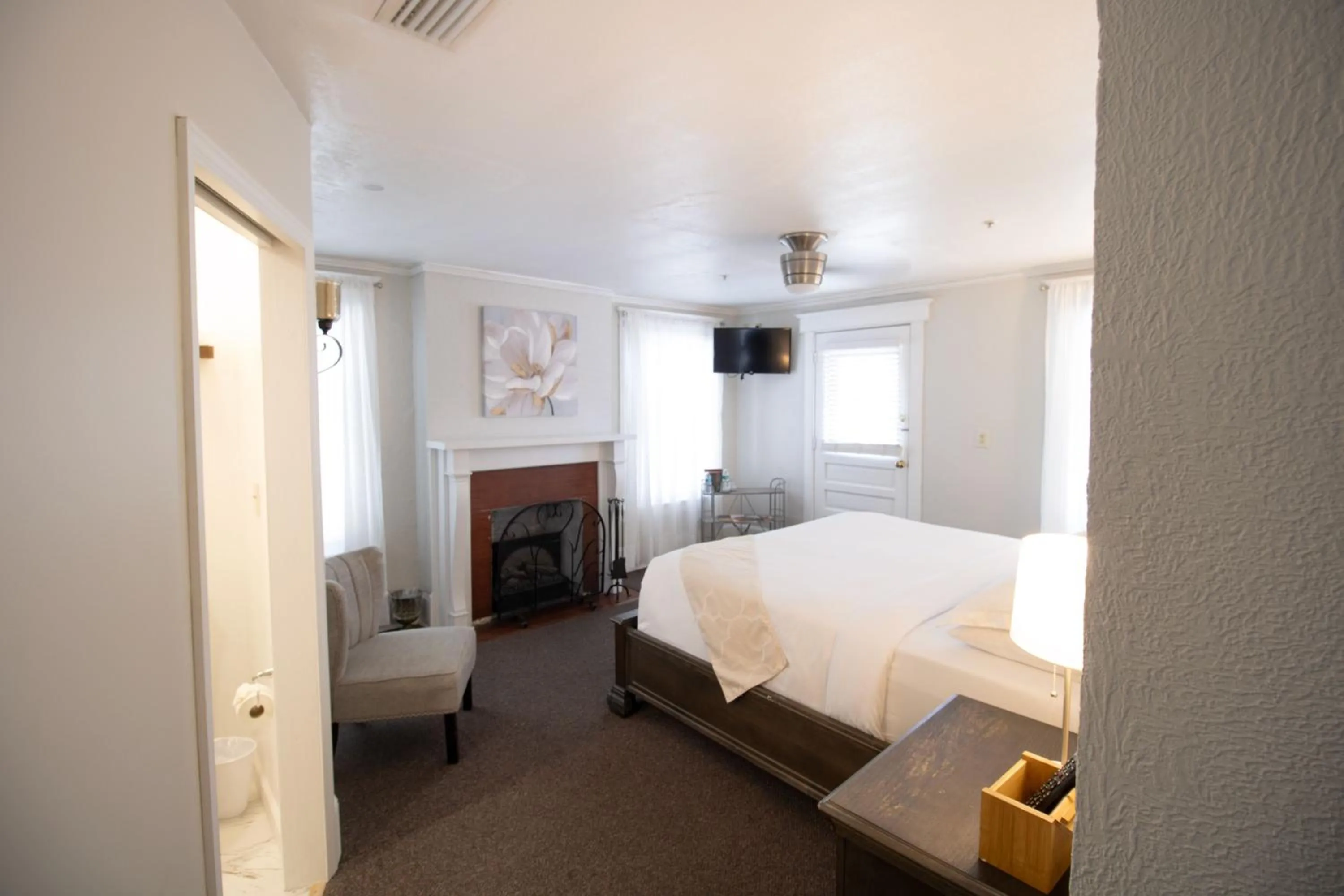 Bed in Inn on Charlotte Boutique Hotel