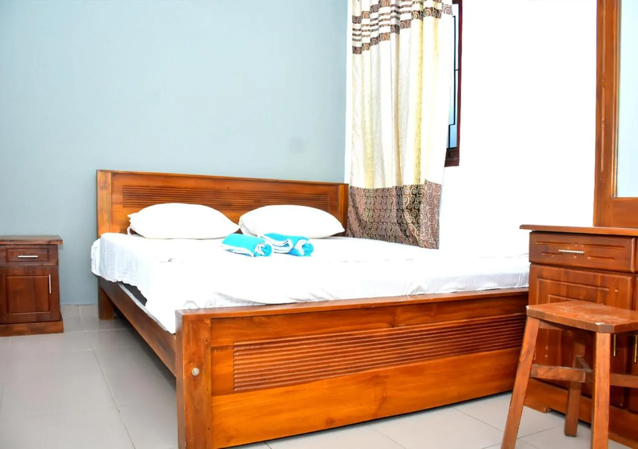 Bed in Yuthika Resort