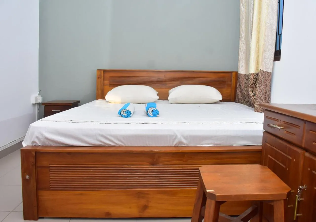 Bed in Yuthika Resort