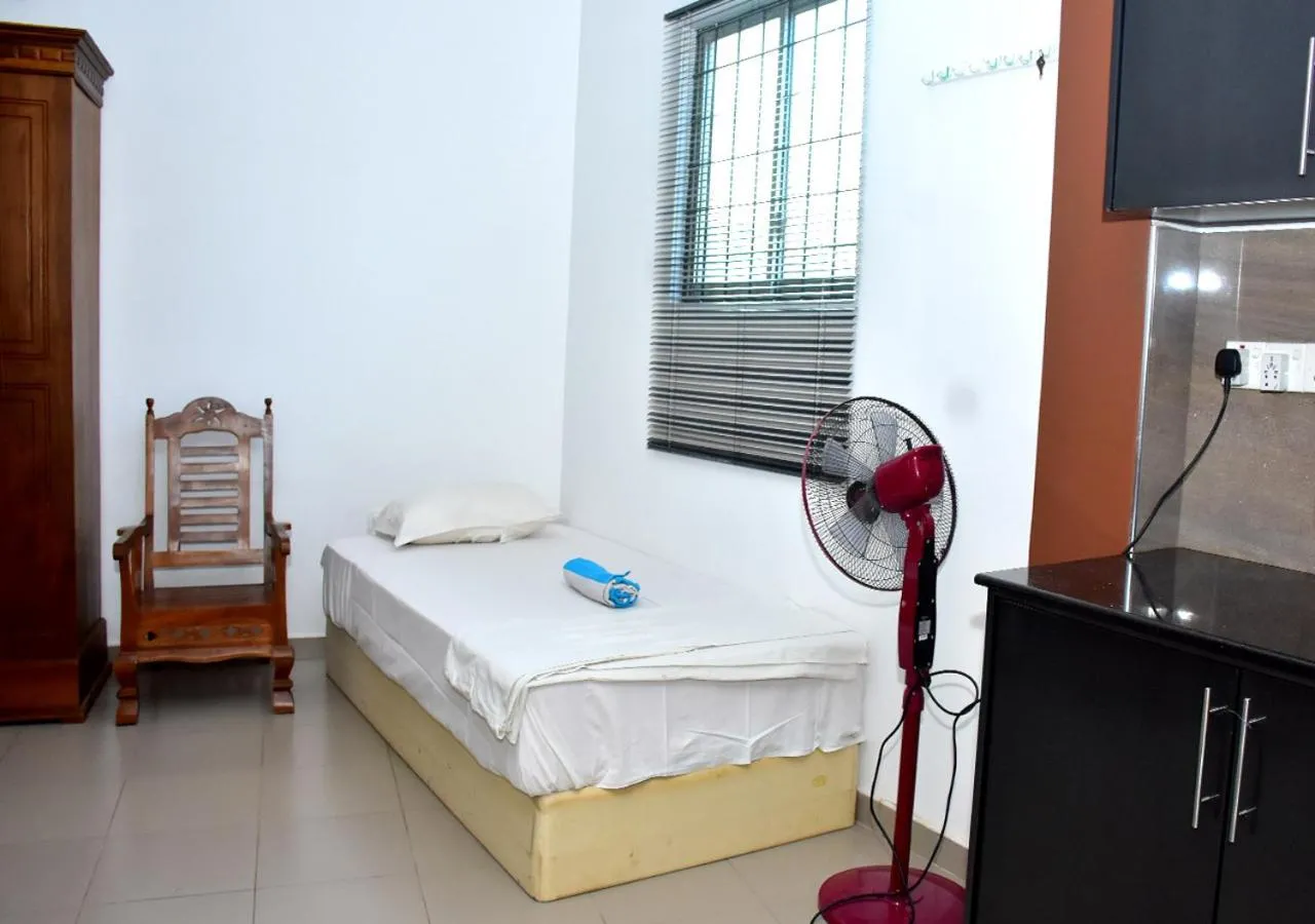 Bed in Yuthika Resort