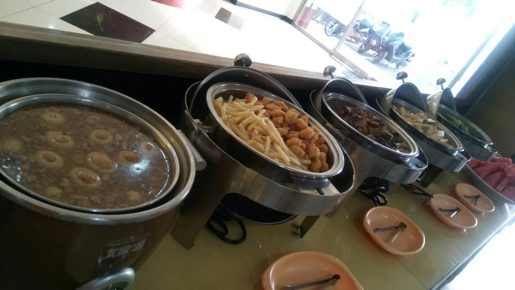 Buffet breakfast in Puti Commercial Hotel