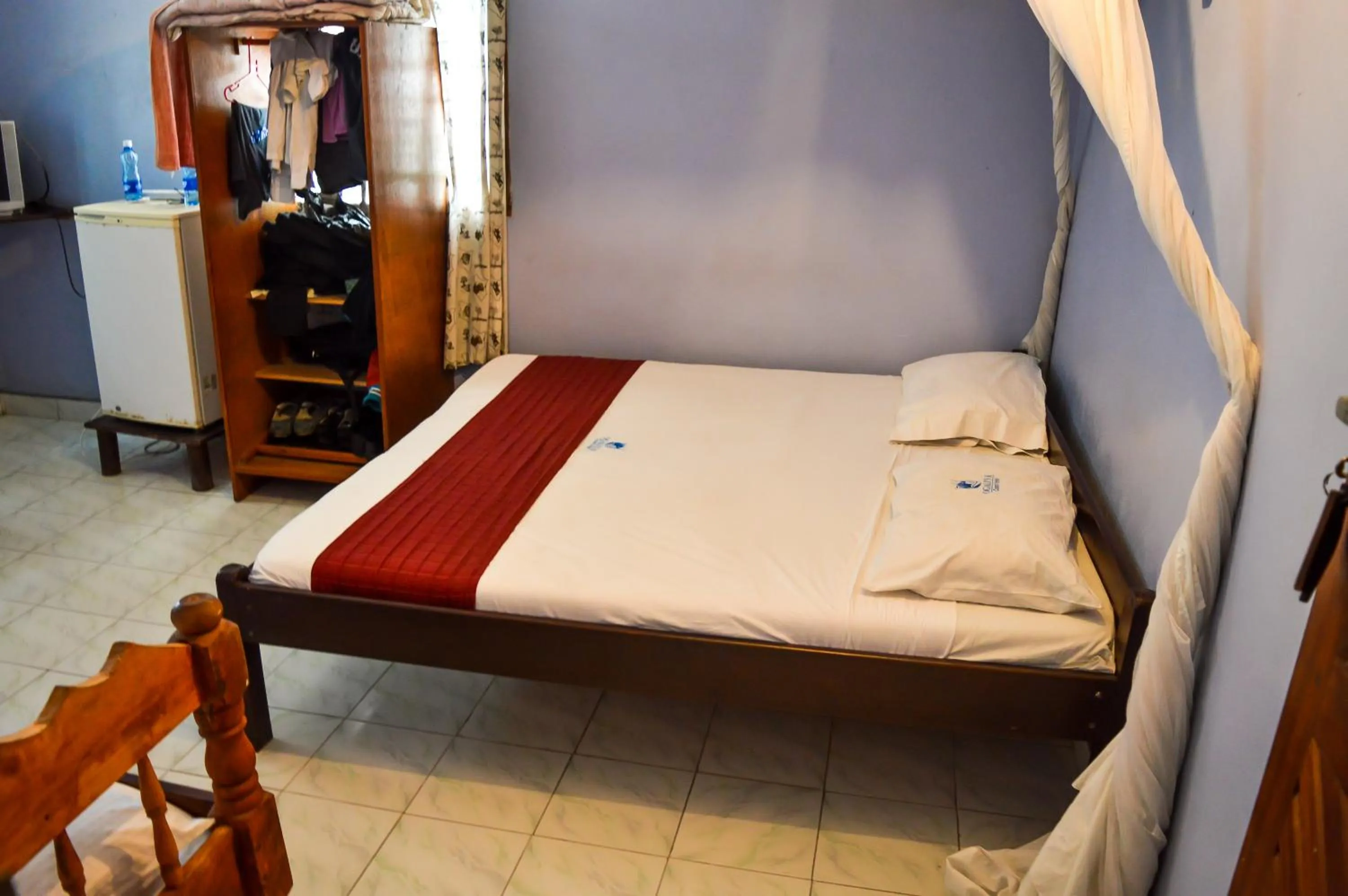 Bed in Ogalis K-coast Hotel