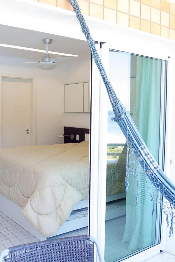 Balcony/Terrace, Bed in Camboinhas Oceanside Oceanfront