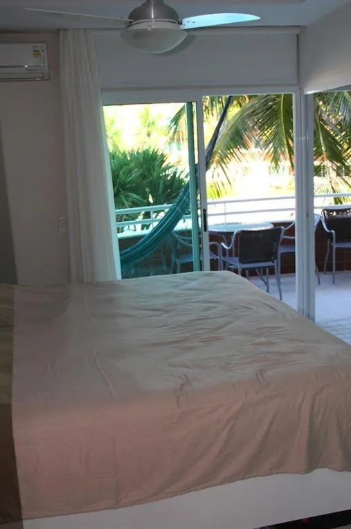 Patio, Bed in Camboinhas Oceanside Oceanfront