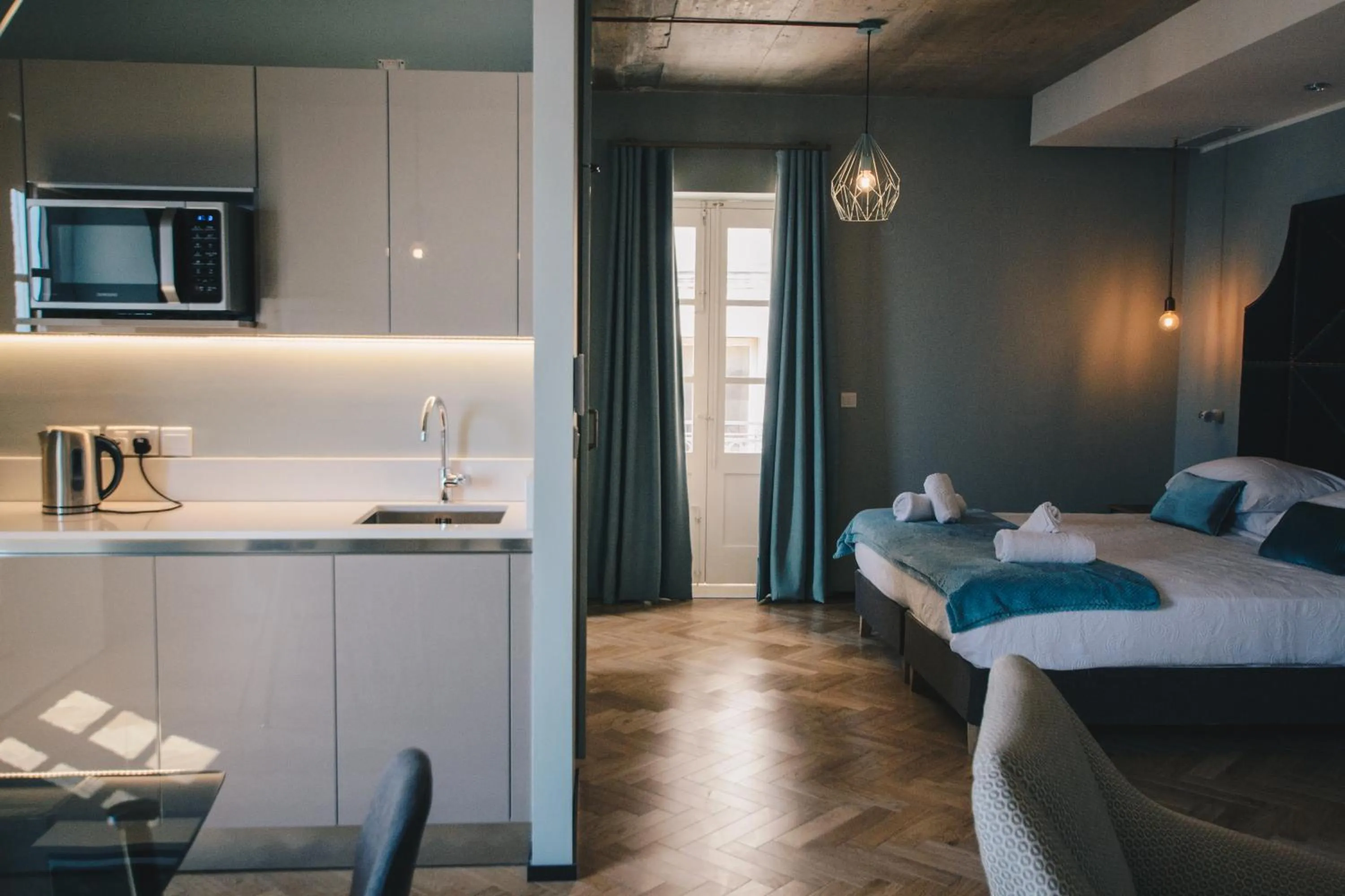 Bed in Sally Port Suites