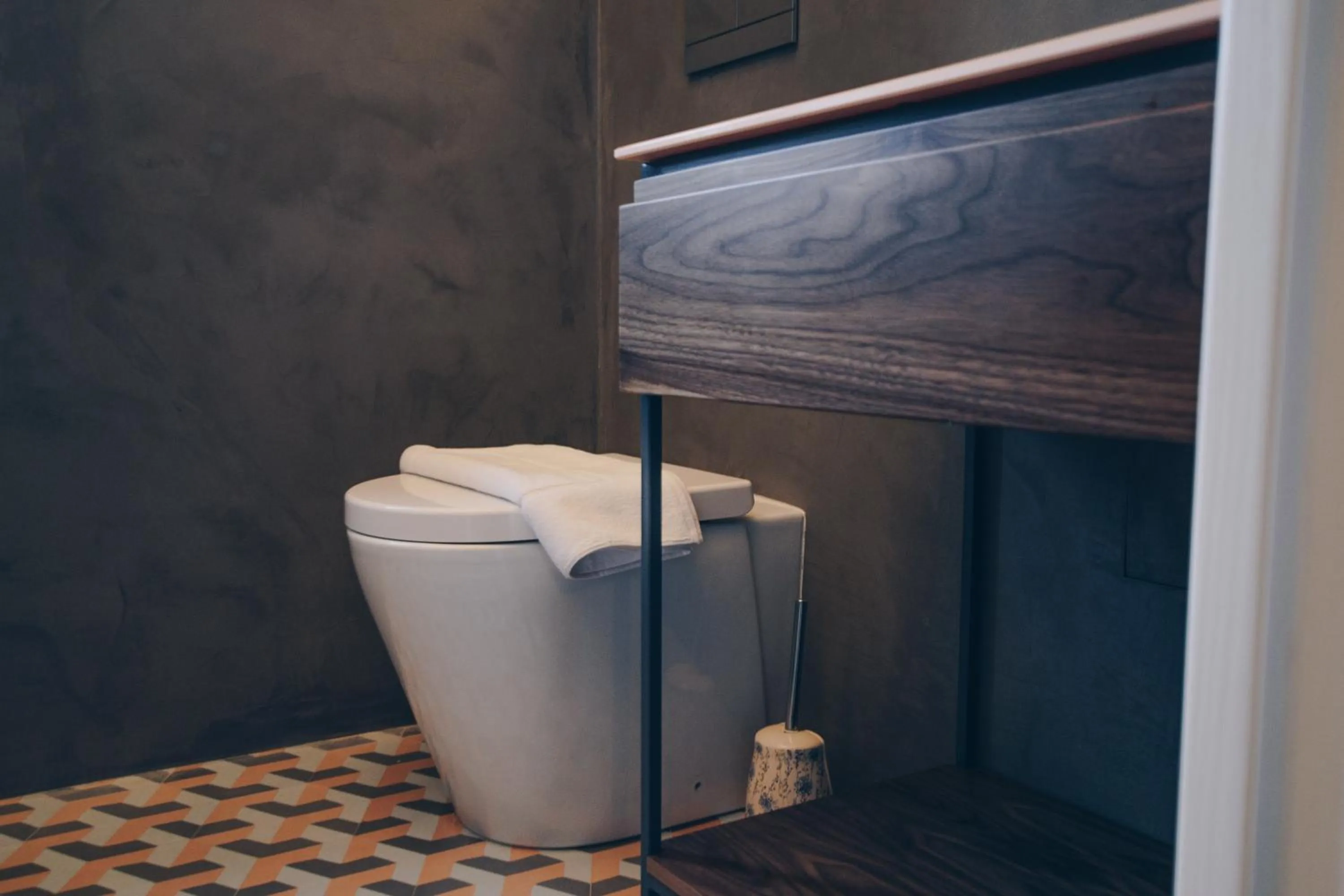 Toilet in Sally Port Suites