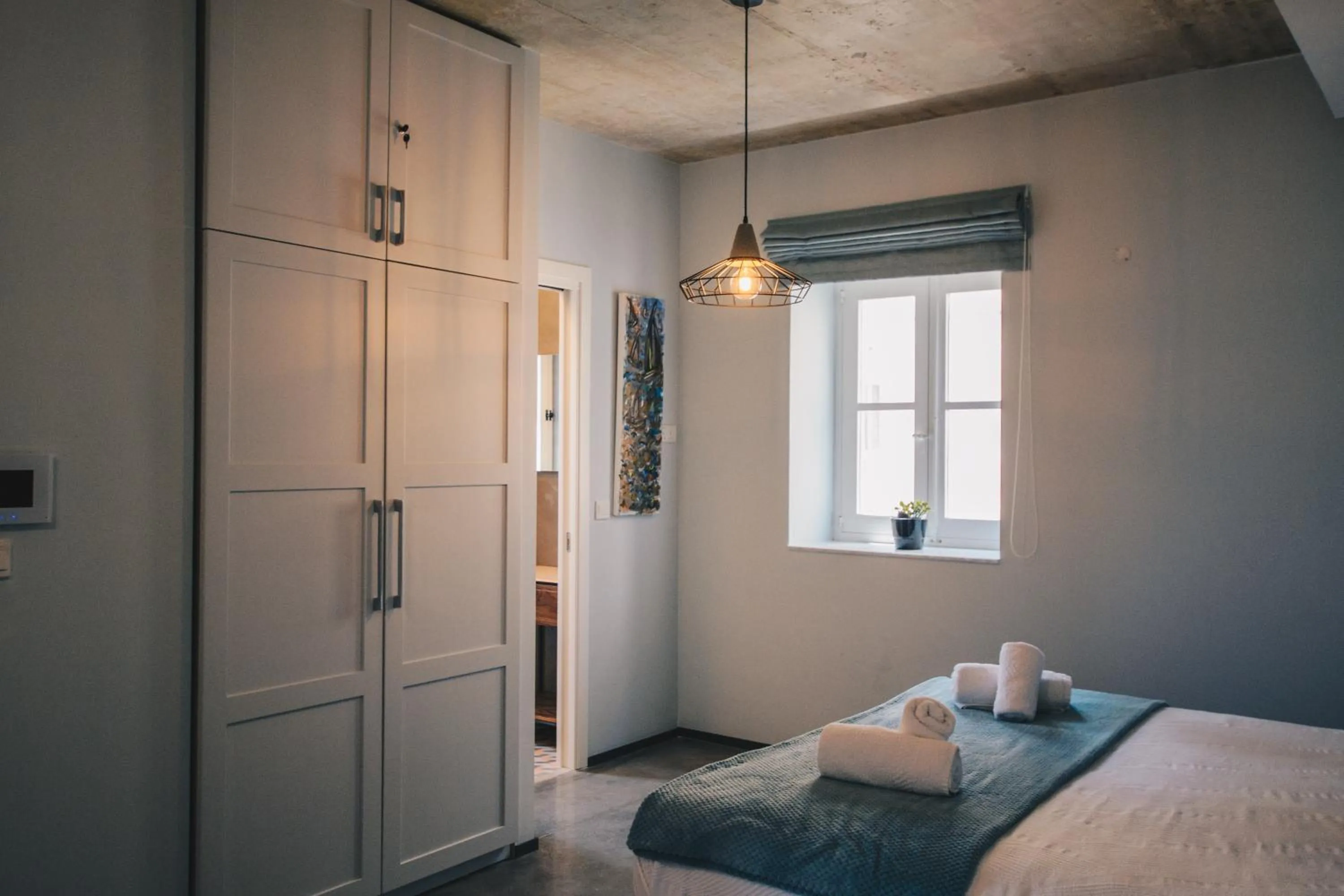 Bed in Sally Port Suites