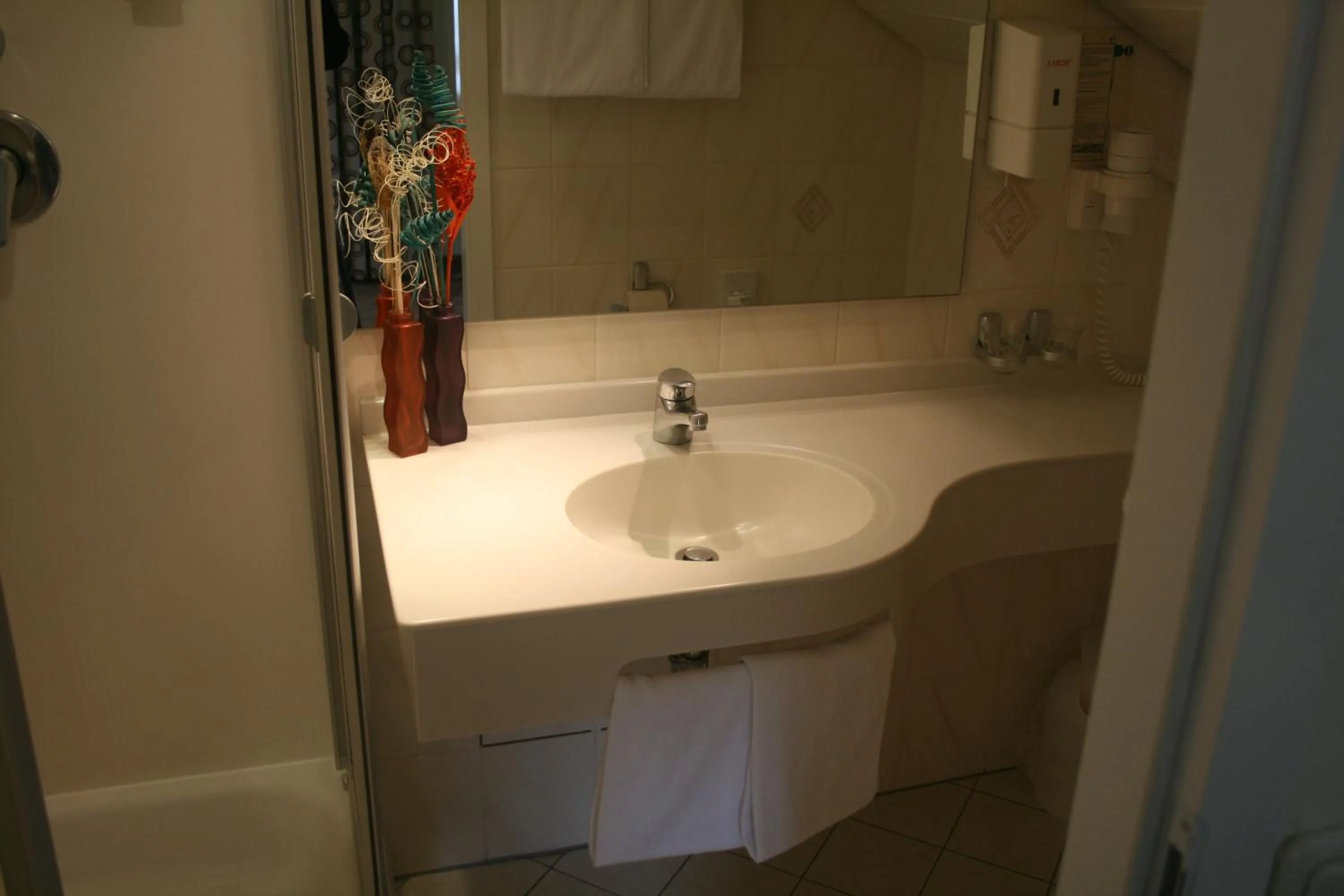 Bed in Logis Gourmet & Relax Wellness Hotel De La Sure