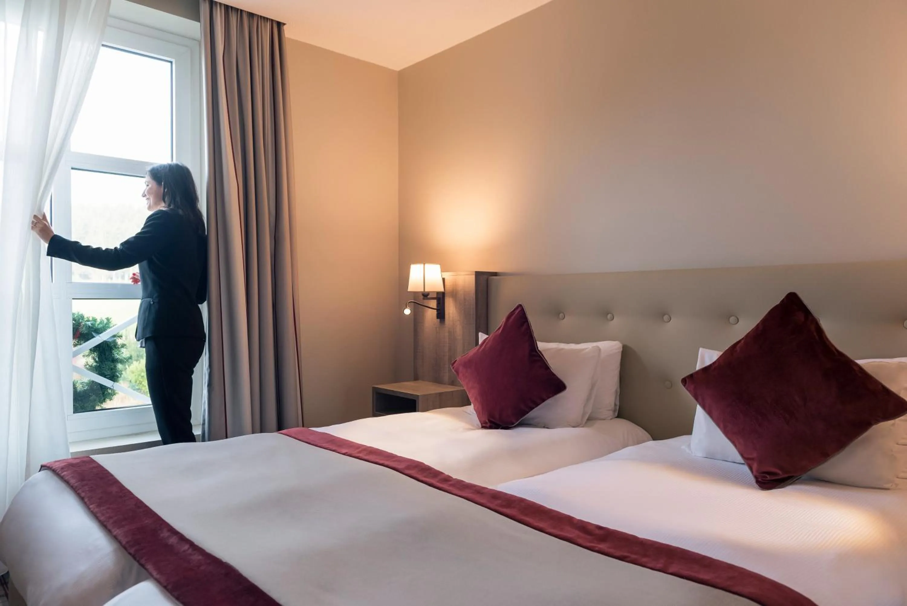 Bed in Mercure Luxembourg Kikuoka Golf & Spa