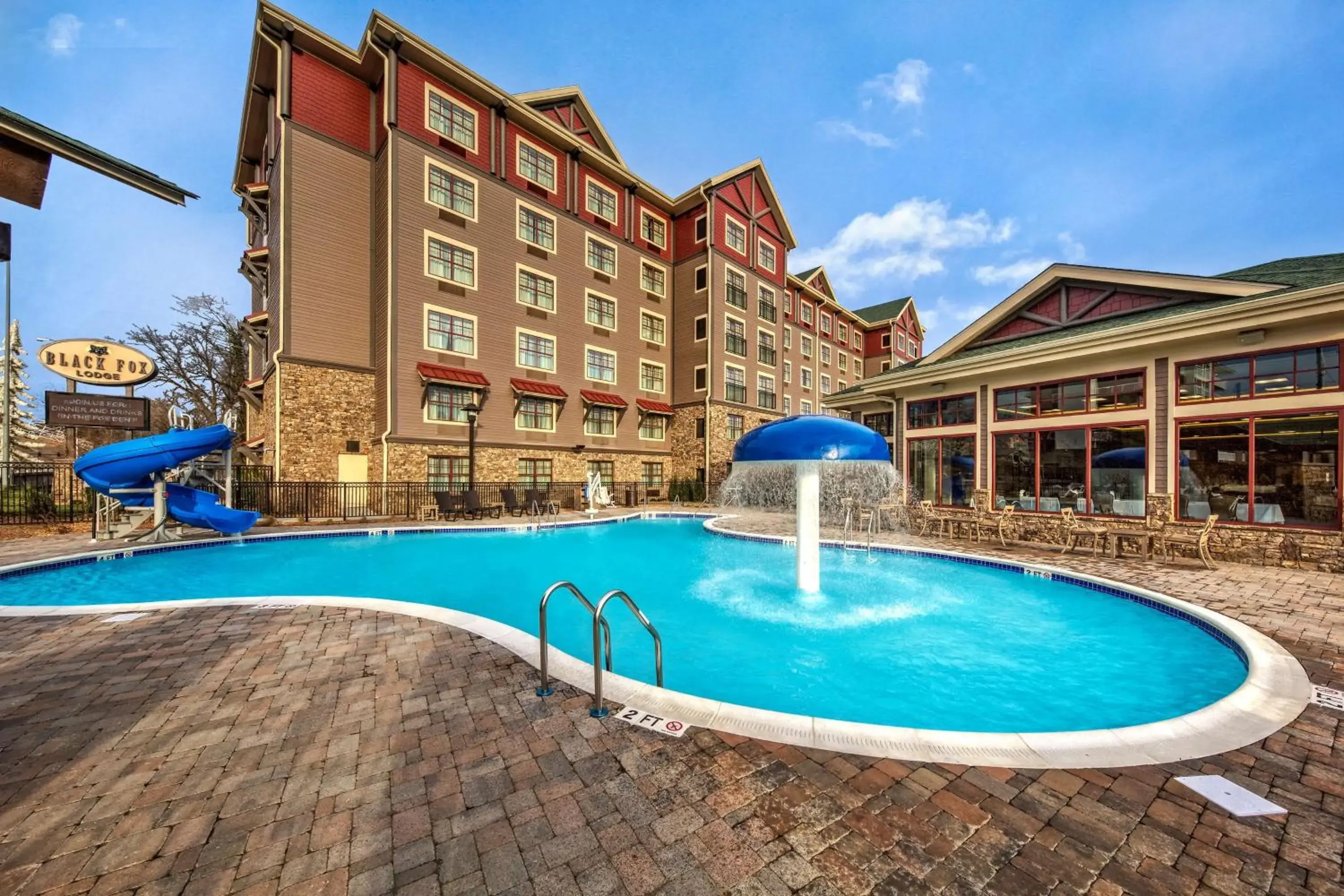 Pool view in Black Fox Lodge Pigeon Forge, Tapestry Collection by Hilton Pool view in Black Fox Lodge Pigeon Forge, Tapestry Collection by Hilton