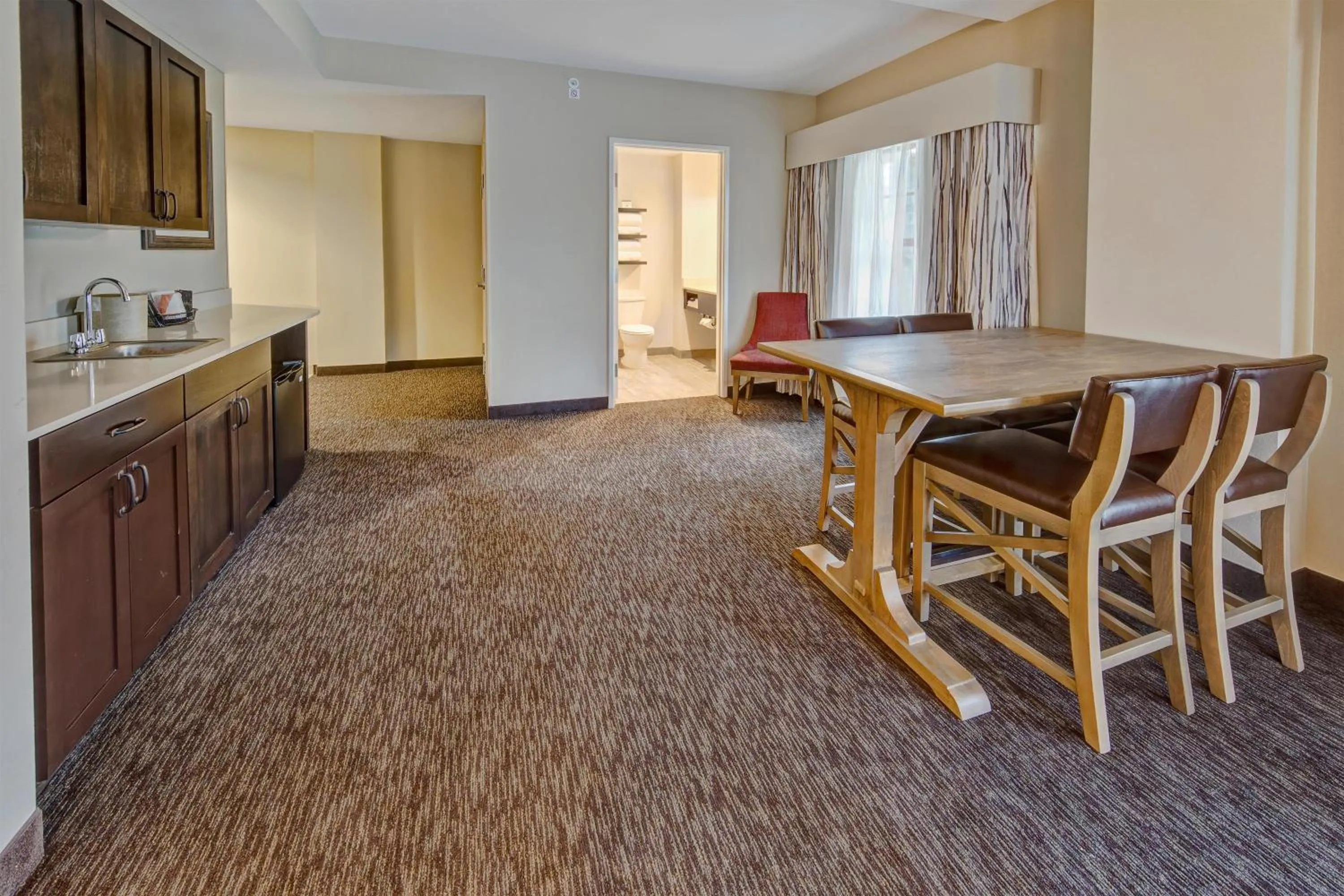 Living room in Black Fox Lodge Pigeon Forge, Tapestry Collection by Hilton