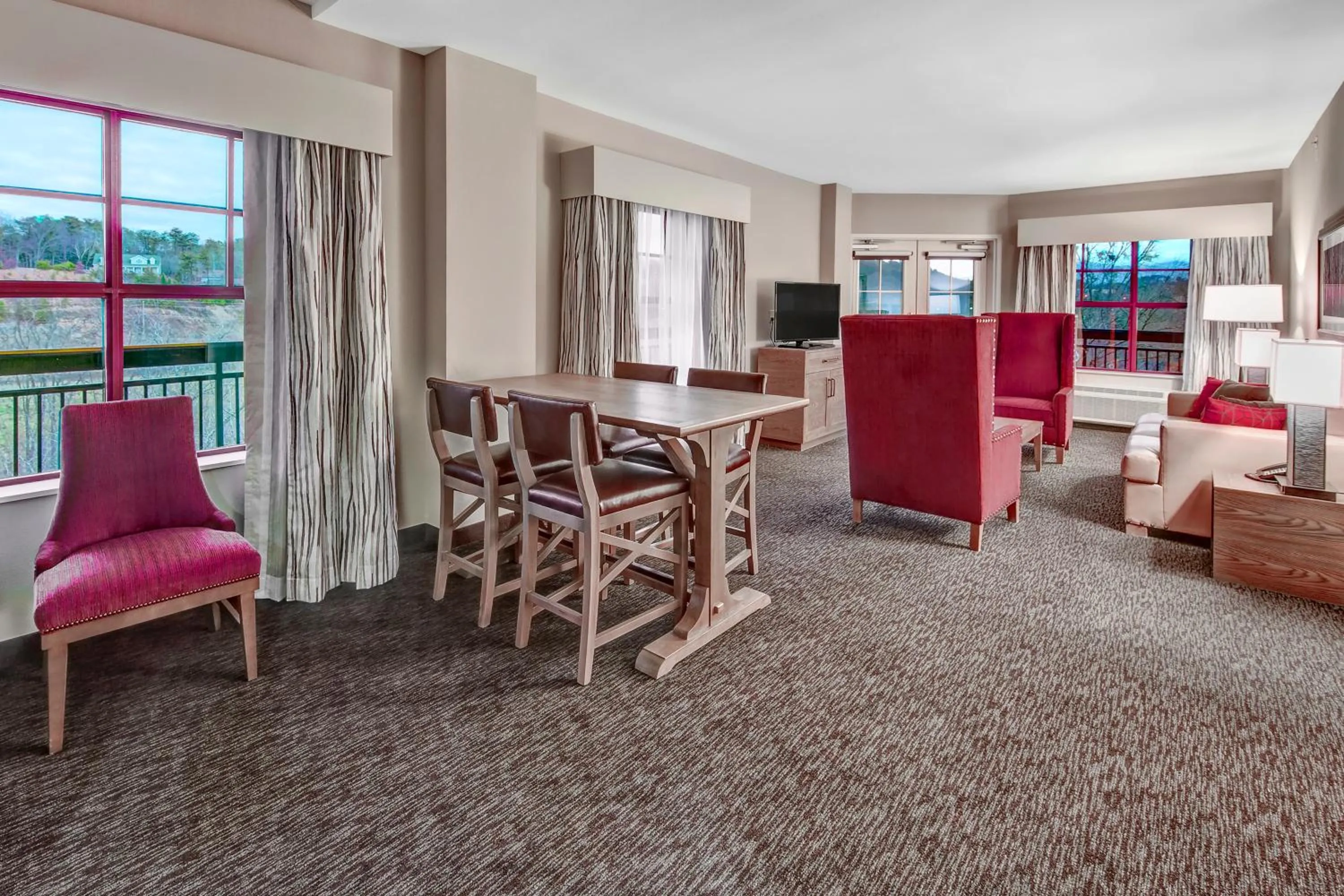 Living room in Black Fox Lodge Pigeon Forge, Tapestry Collection by Hilton