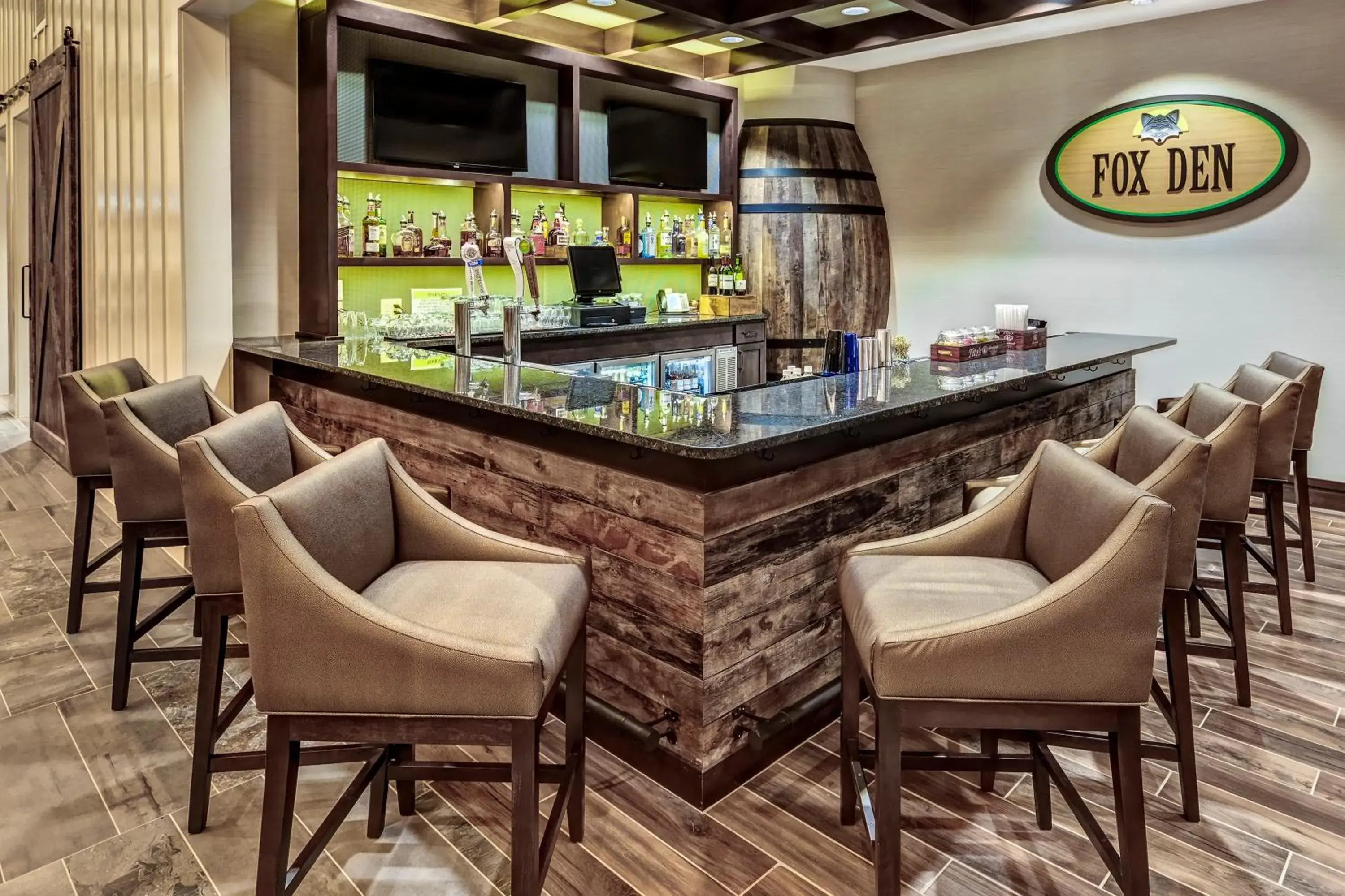 Lounge or bar in Black Fox Lodge Pigeon Forge, Tapestry Collection by Hilton Lounge or bar in Black Fox Lodge Pigeon Forge, Tapestry Collection by Hilton