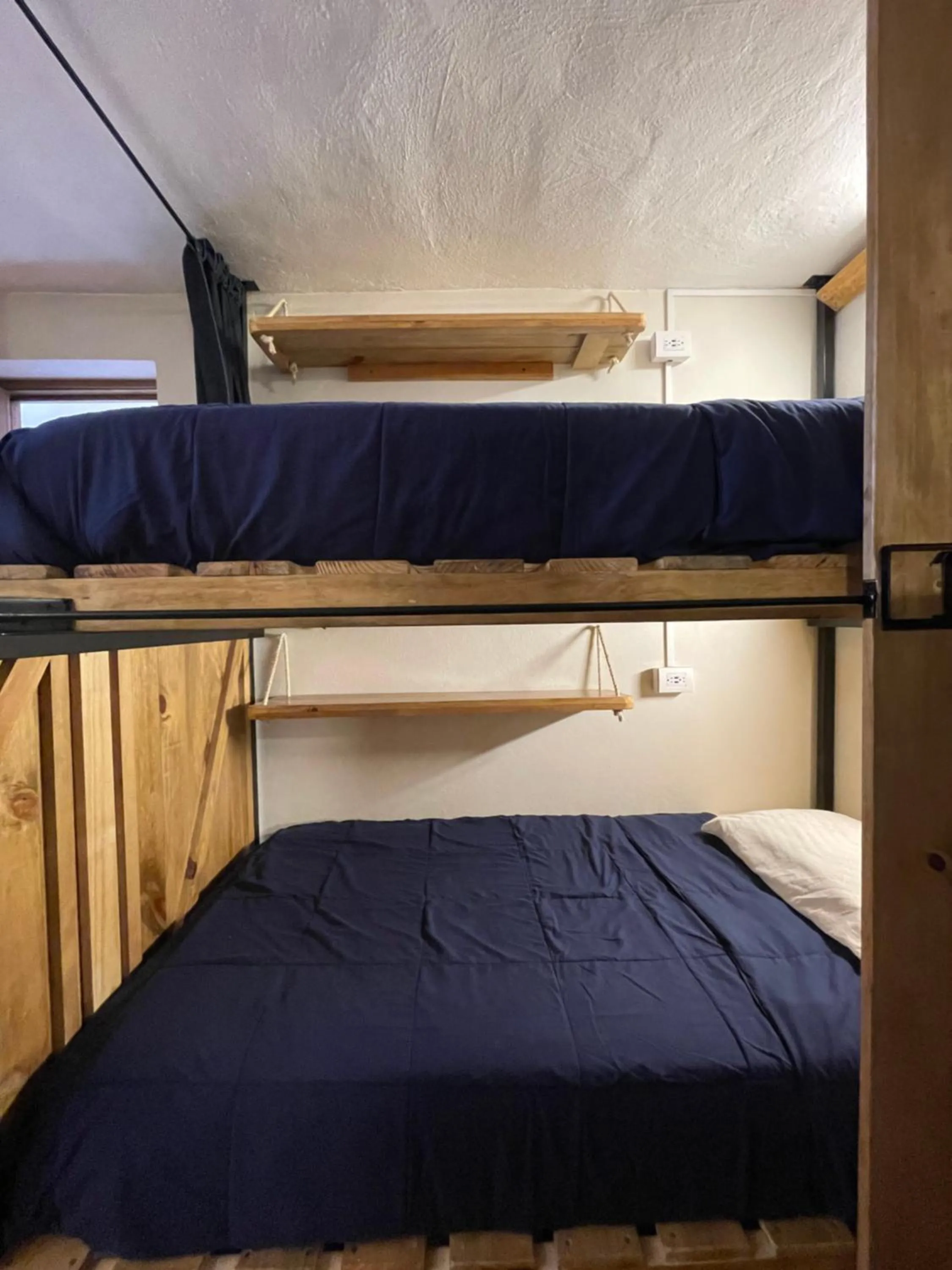 Bed in Hostal La Isla