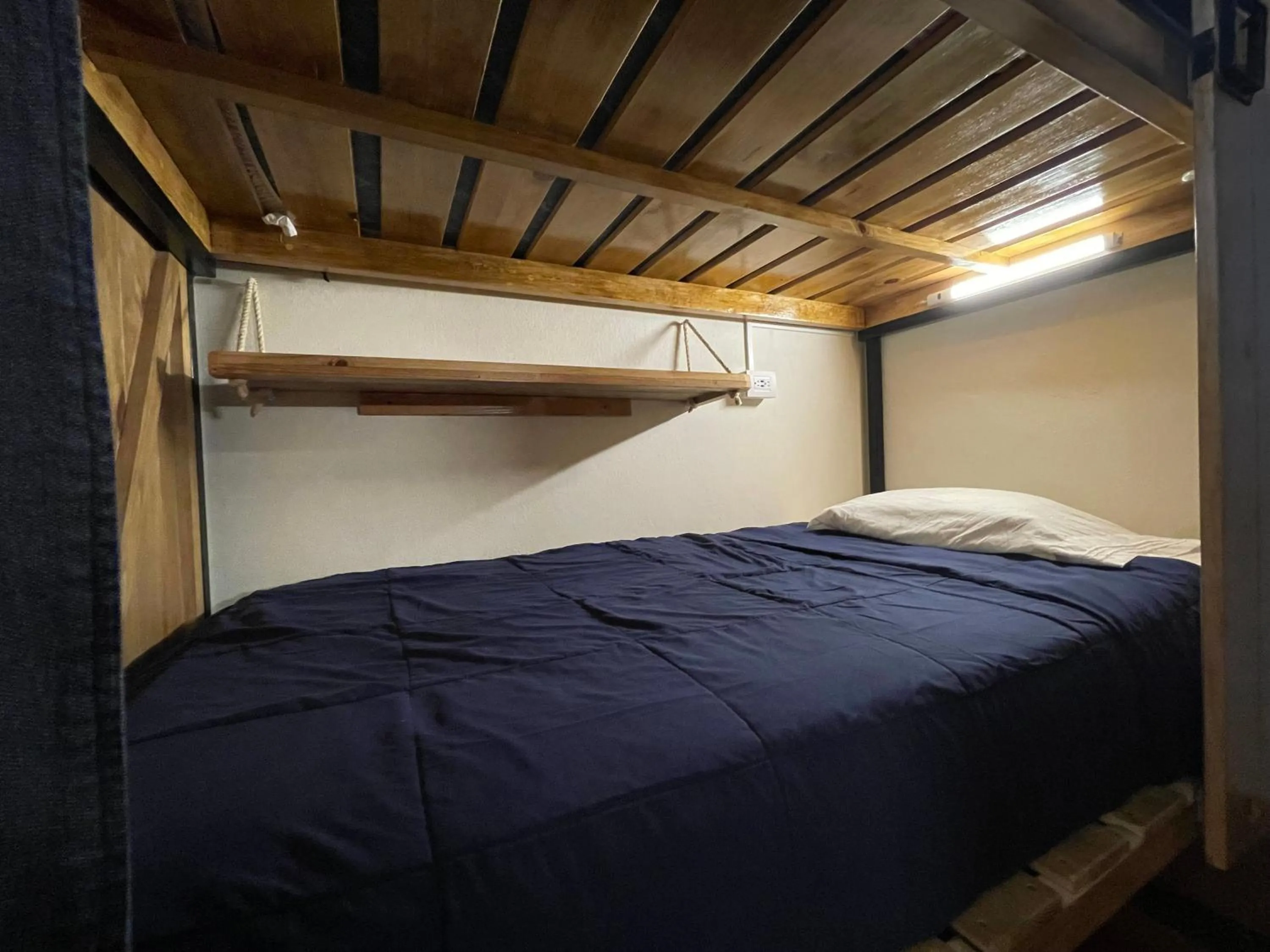 Bed in Hostal La Isla