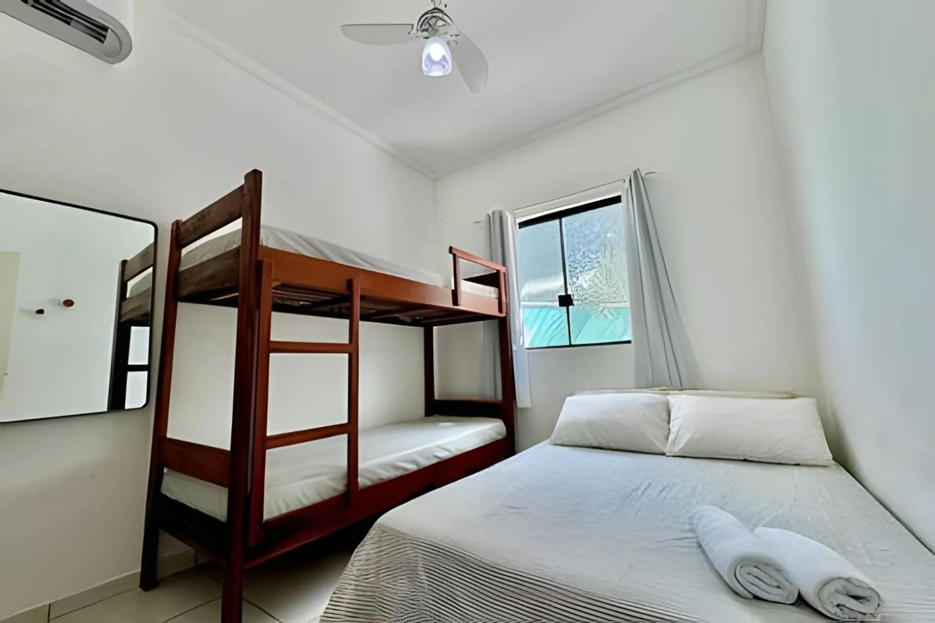 Bed in Apartamentos Recanto da Barra