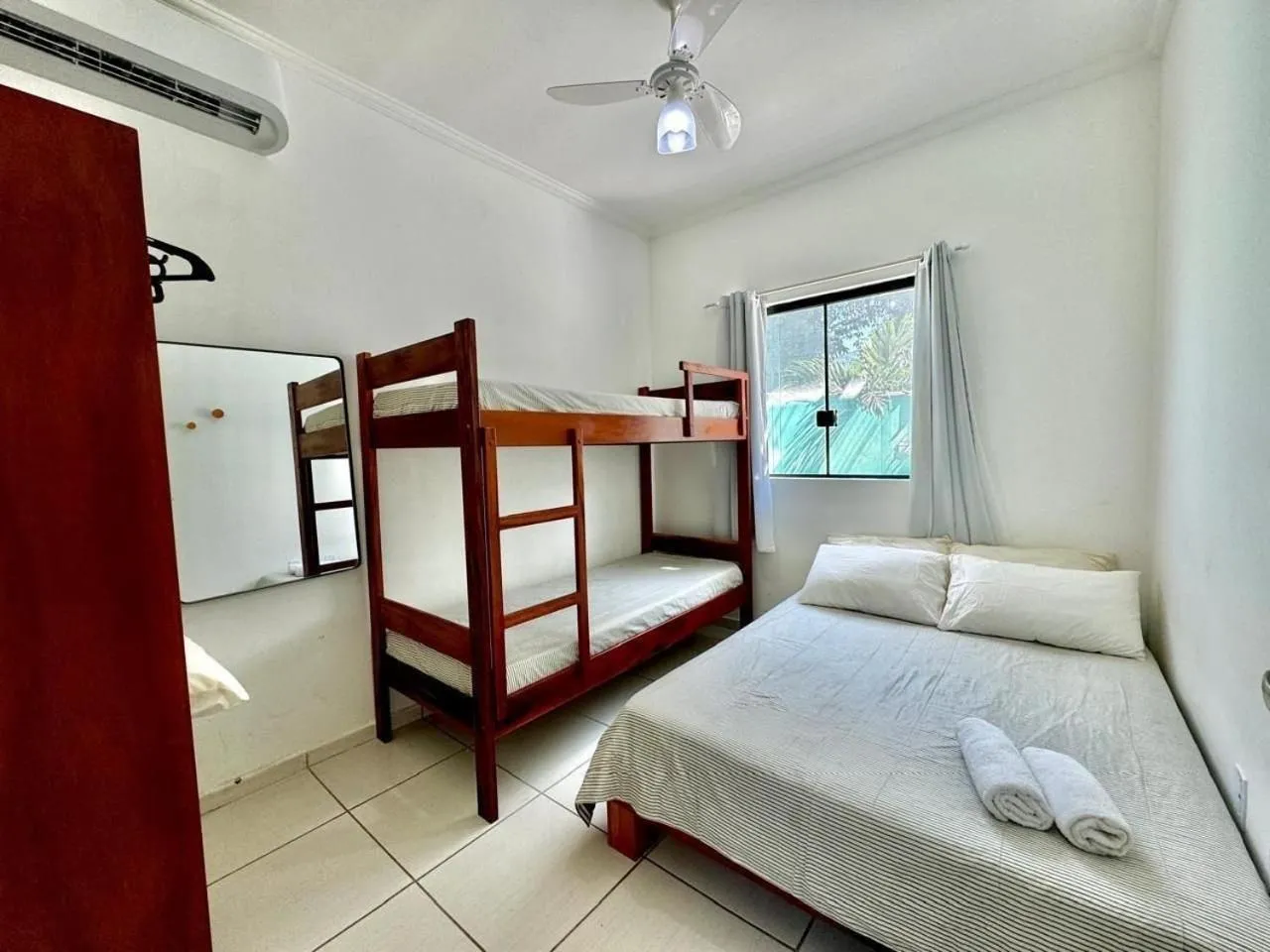 Bed in Apartamentos Recanto da Barra