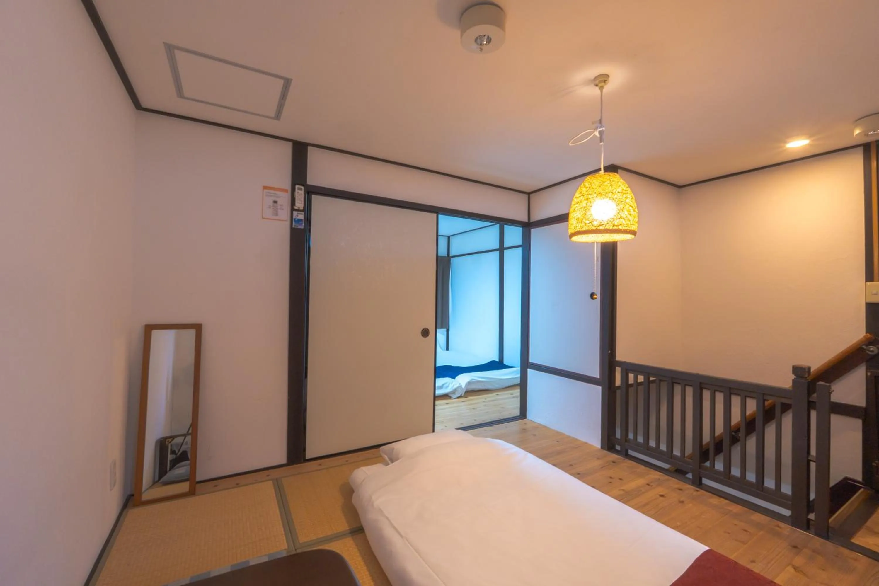 Photo of the whole room, Bed in Guest house Connection Karasuma Gojo