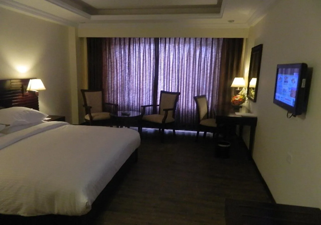 TV and multimedia, Bed in Keshav Clarks Inn Gadag