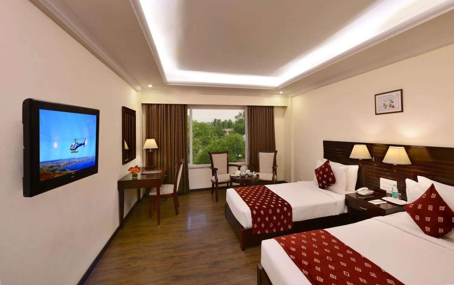TV and multimedia, Bed in Keshav Clarks Inn Gadag