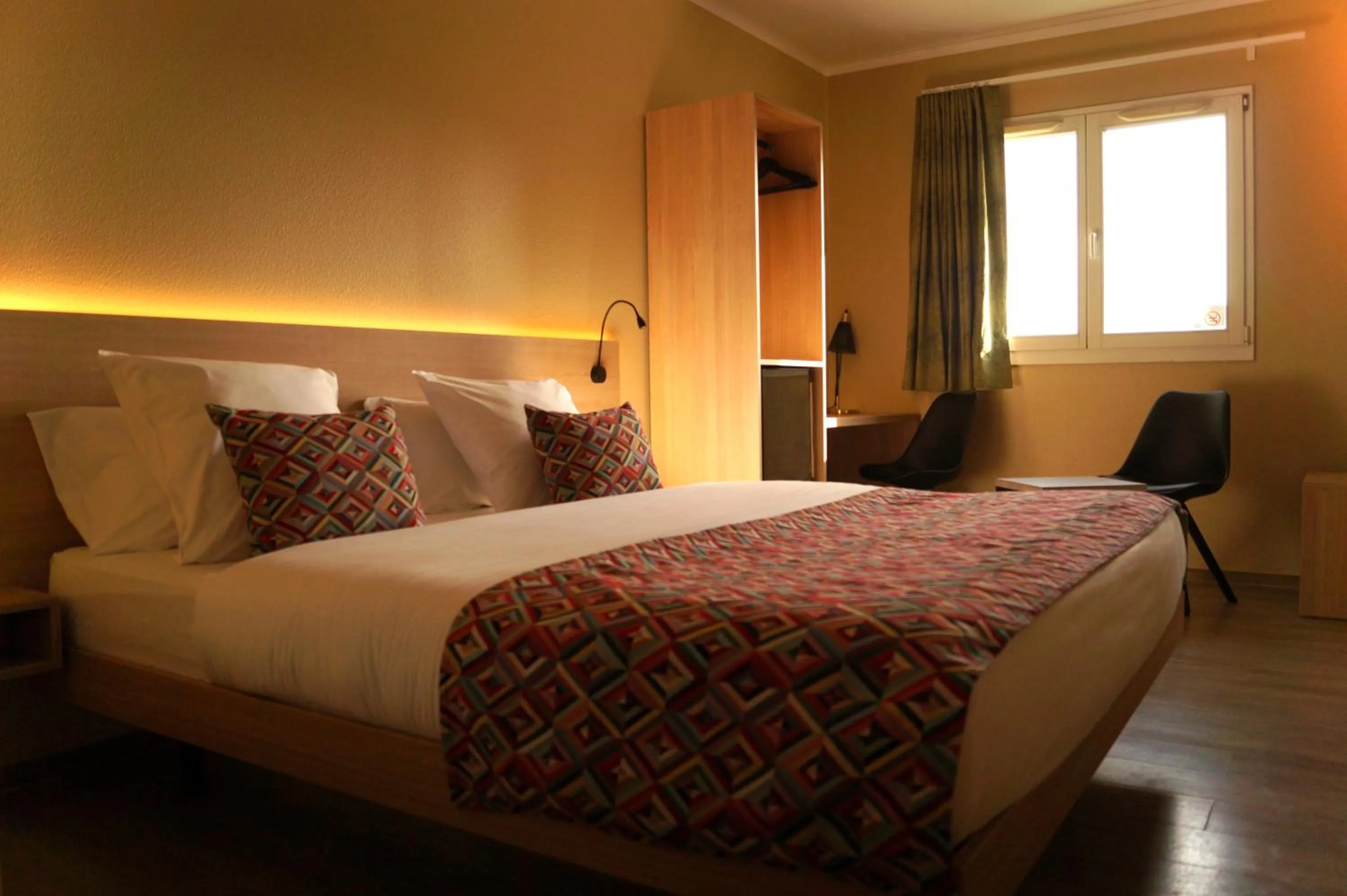 Bed in Hotel-Restaurant Stand'Inn