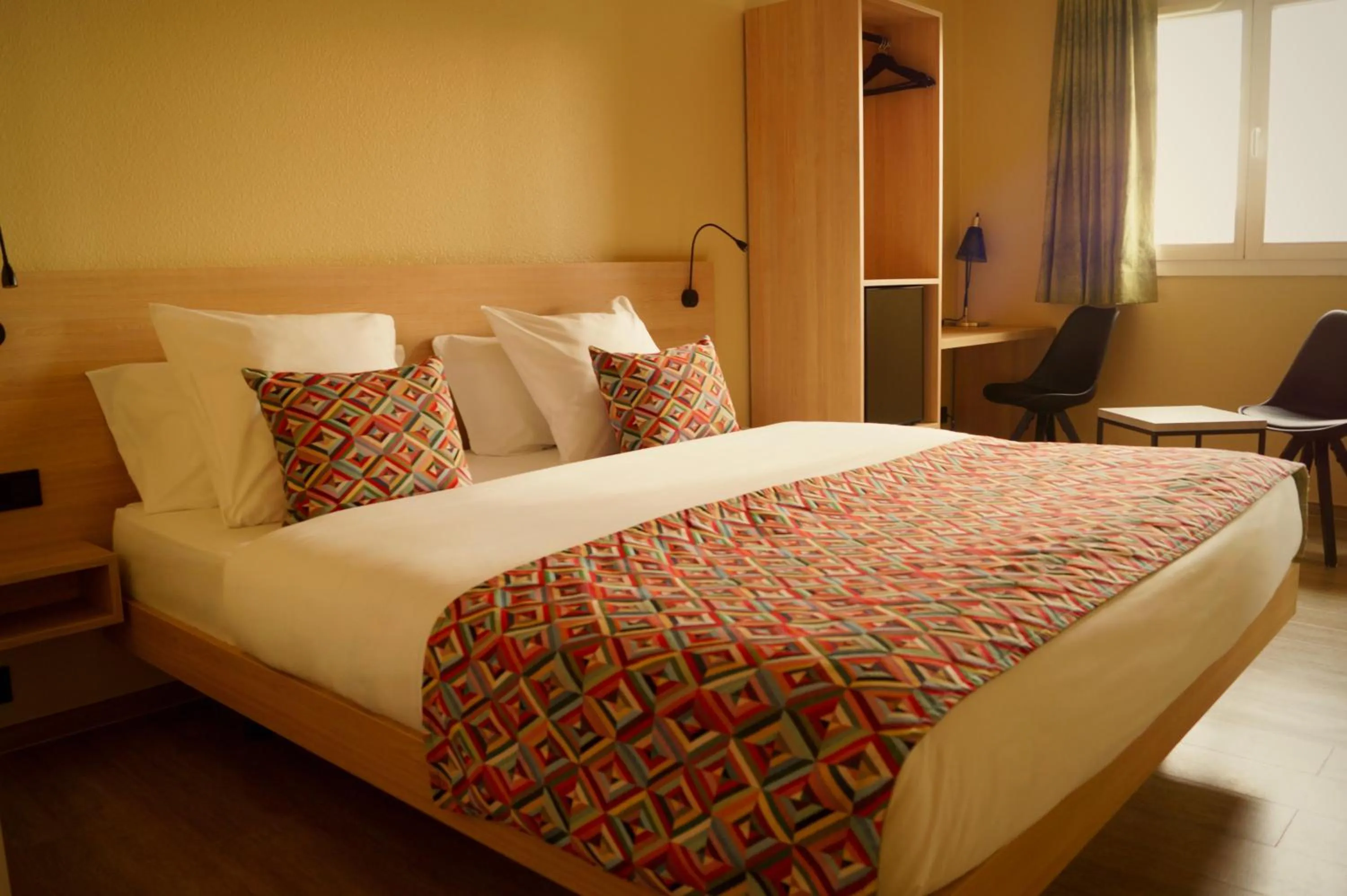 Bed in Hotel-Restaurant Stand'Inn