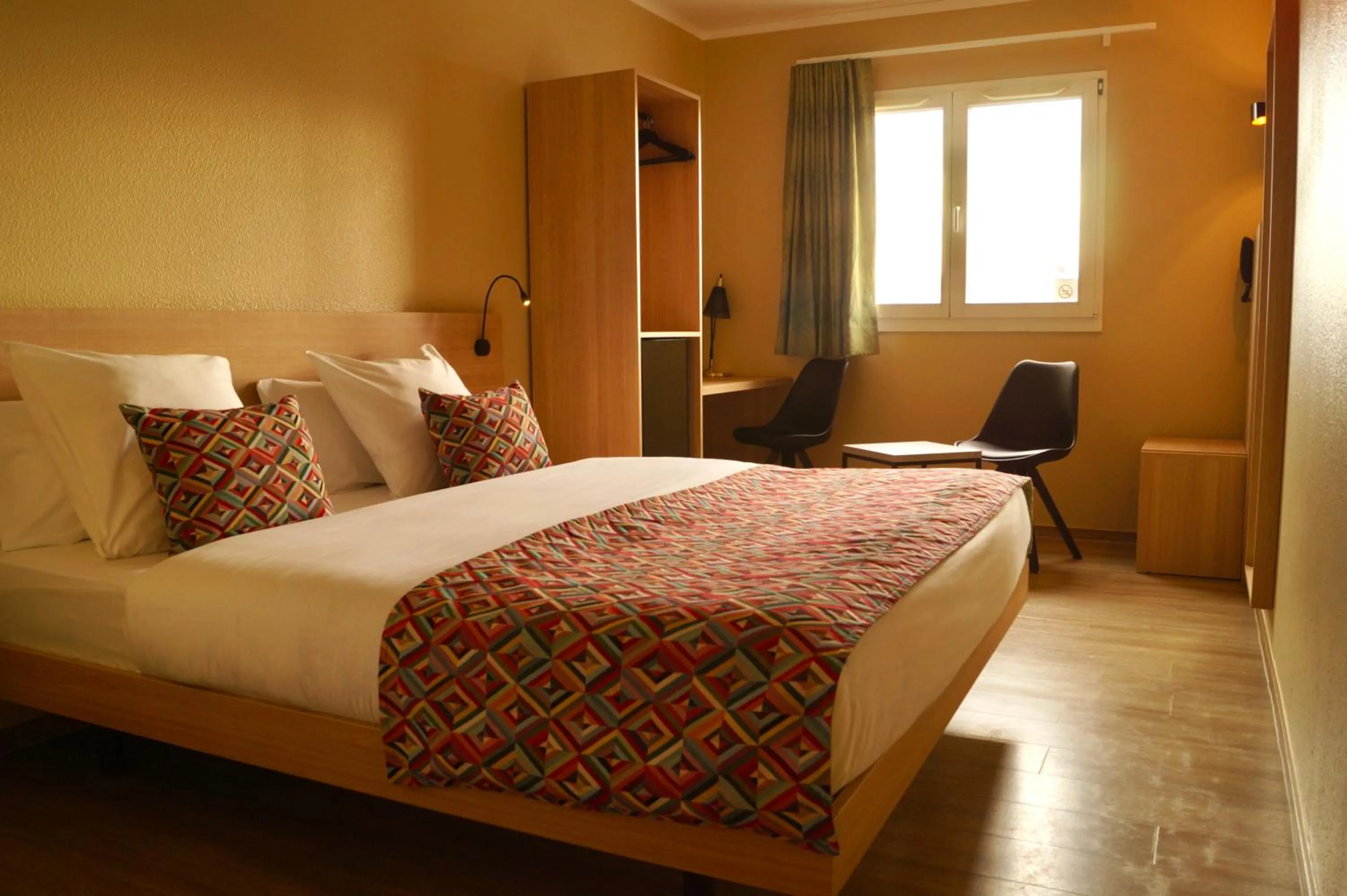 Bed in Hotel-Restaurant Stand'Inn