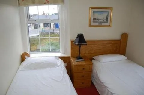 Bed in Railway House Guest House
