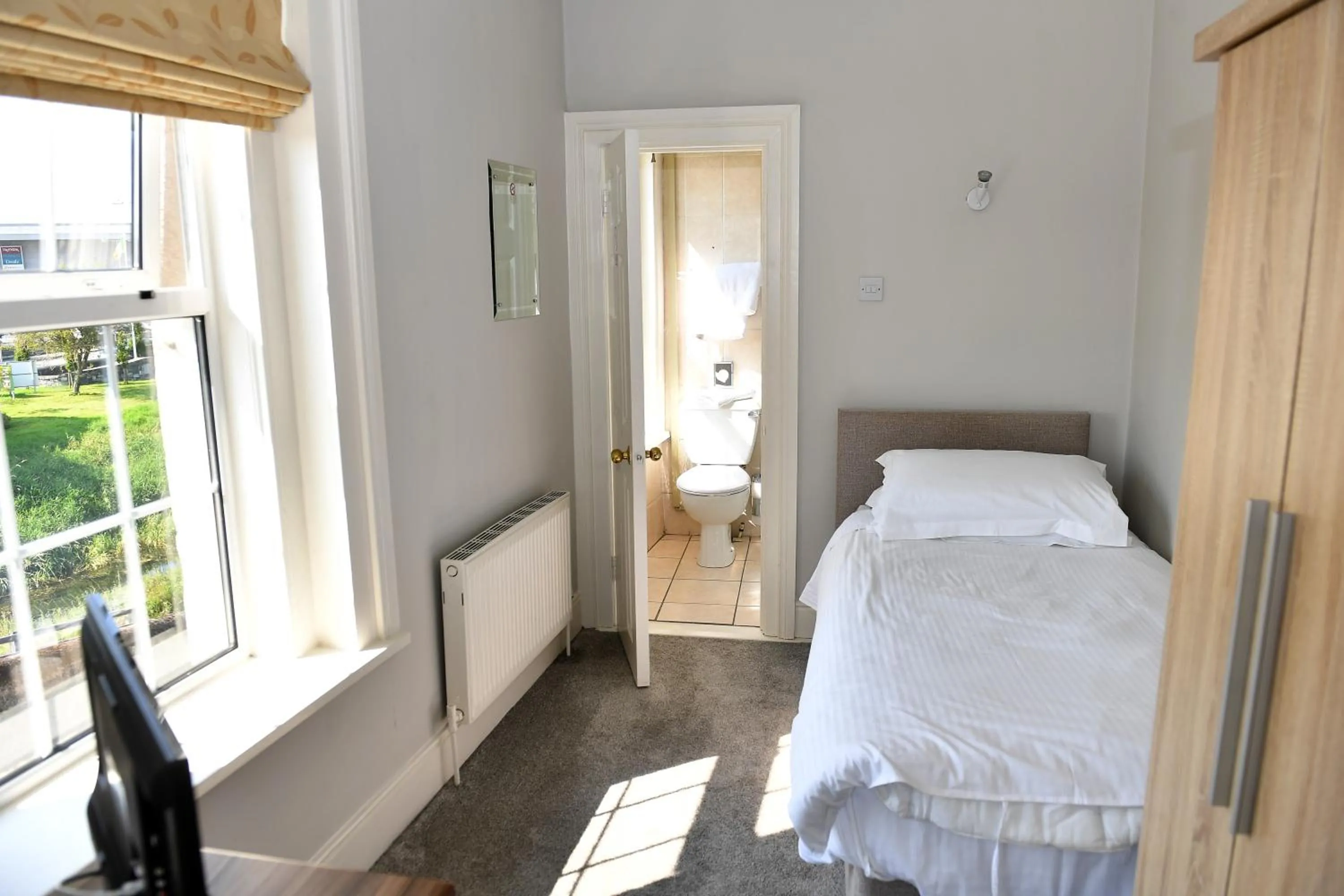 Bed in Railway House Guest House