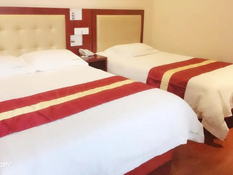 Bed in GreenTree Inn Shanghai Outlets National Convention Centre XuLe Road Shell Hotel