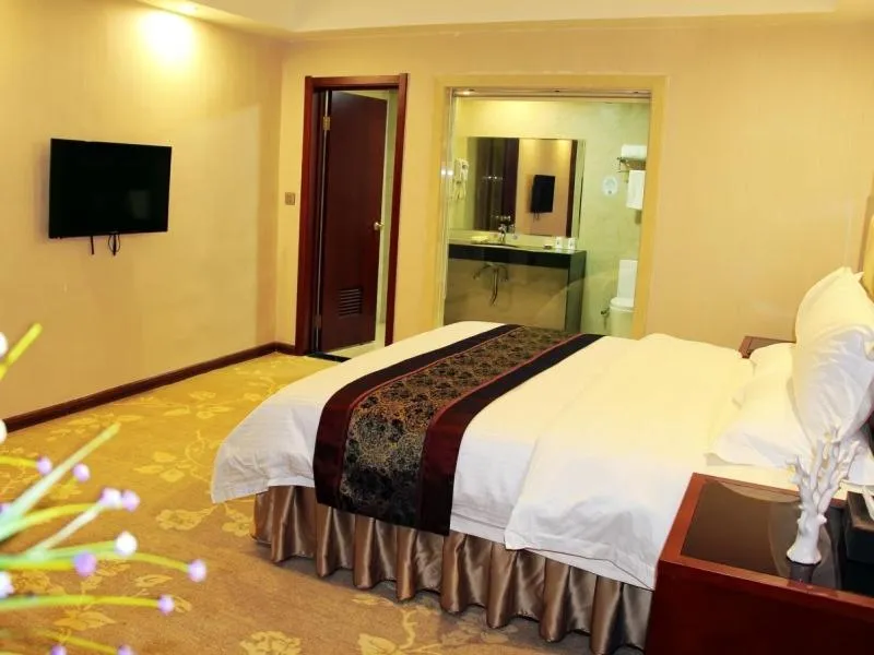 Bed in GreenTree Inn GuangDong Jieyang Konggang District Wangjiang North Road Business Hotel