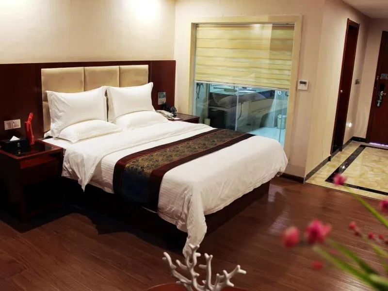 Bed in GreenTree Inn GuangDong Jieyang Konggang District Wangjiang North Road Business Hotel