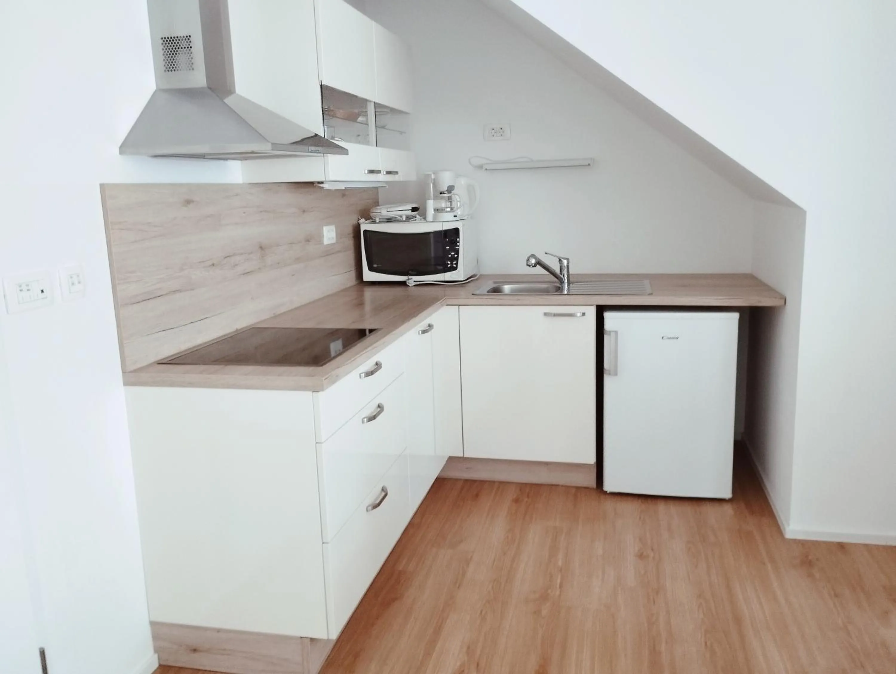 Kitchen or kitchenette in Apartments Wallas