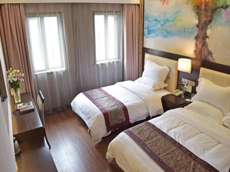 Bed in GreenTree Inn JiangSu Changzhou Dinosaur Park Global Harbor Express Hotel