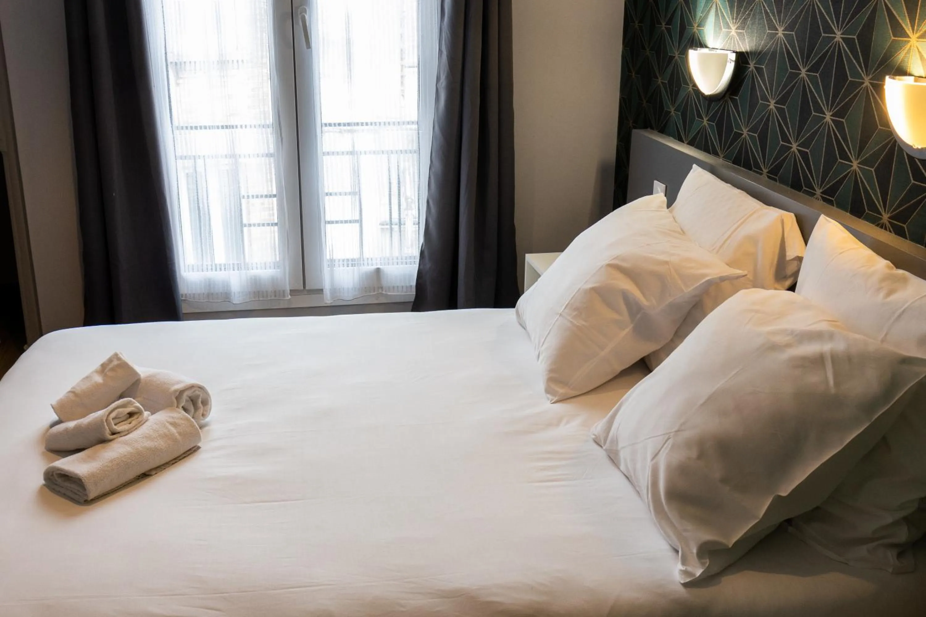 Bedroom in Hotel Luxia