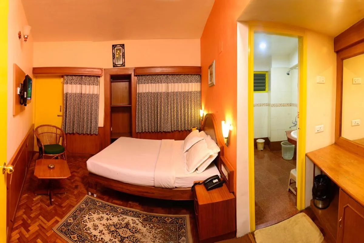 Bed in Hotel Grand Palace