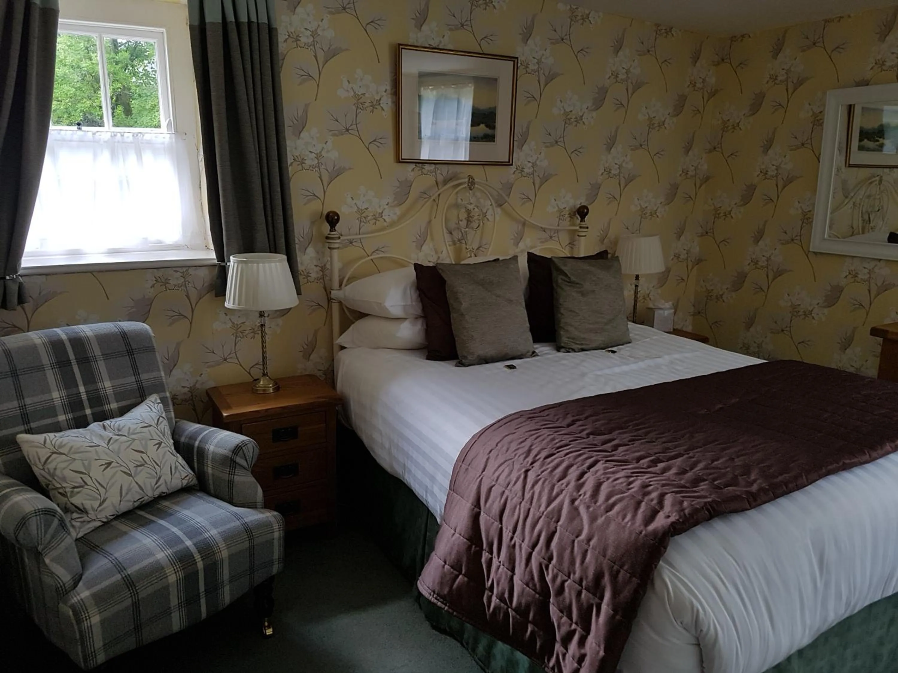 Bed in The Old Dungeon Ghyll Hotel