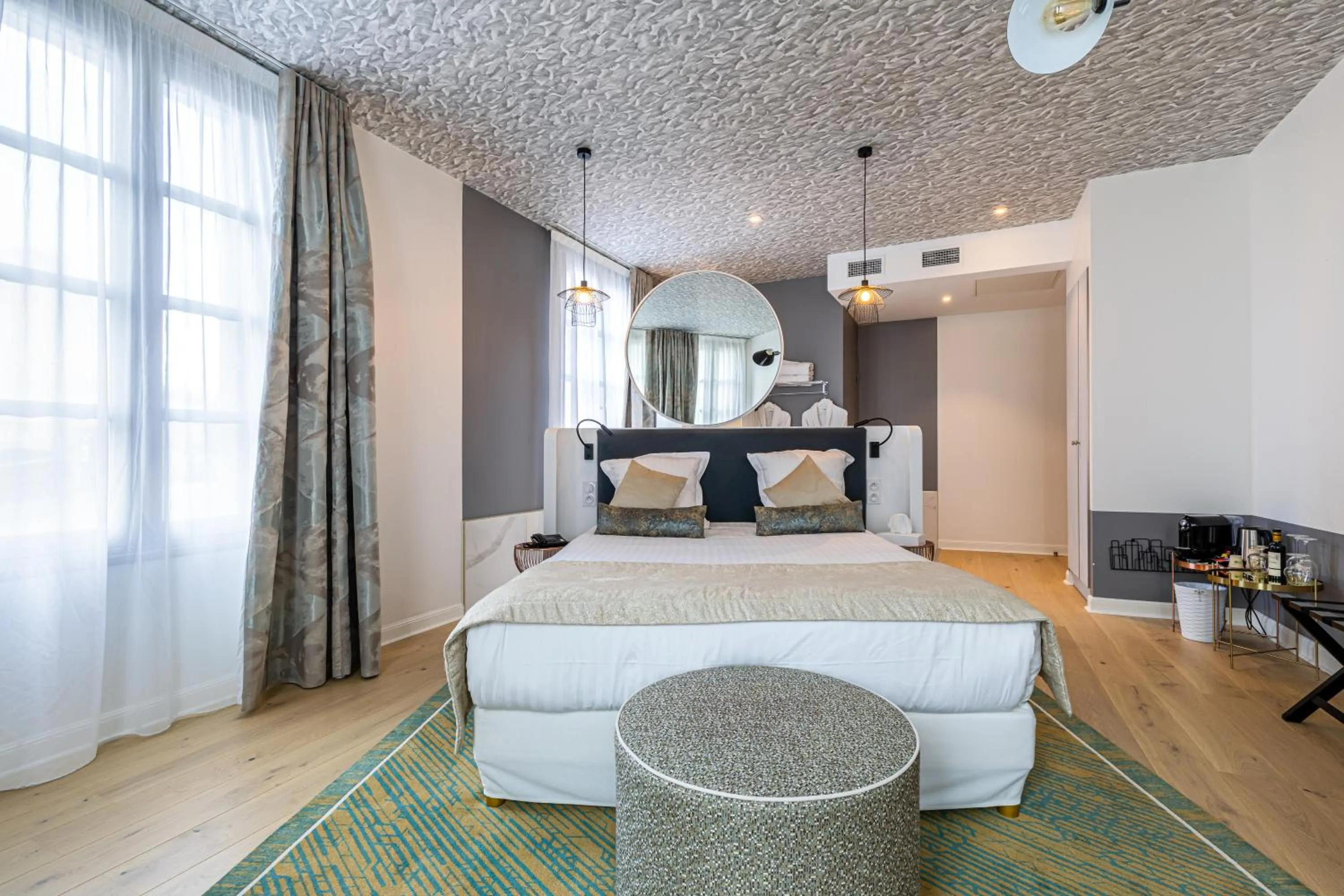 Bed in Hotel Le Saint Gelais