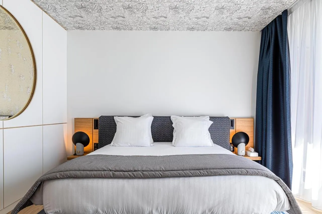 Bed in Hotel Le Saint Gelais