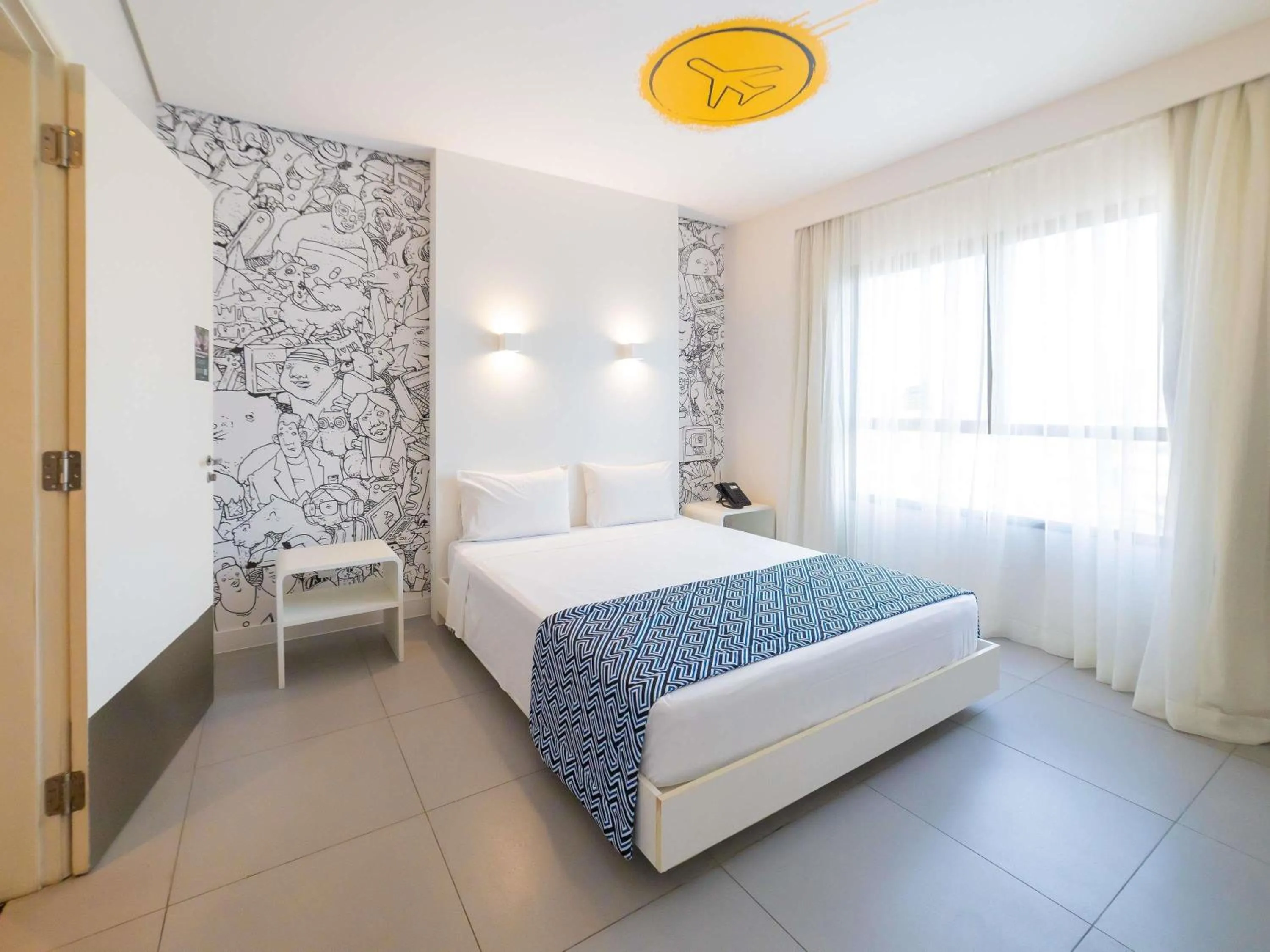 Bedroom in ibis Styles Maracanau