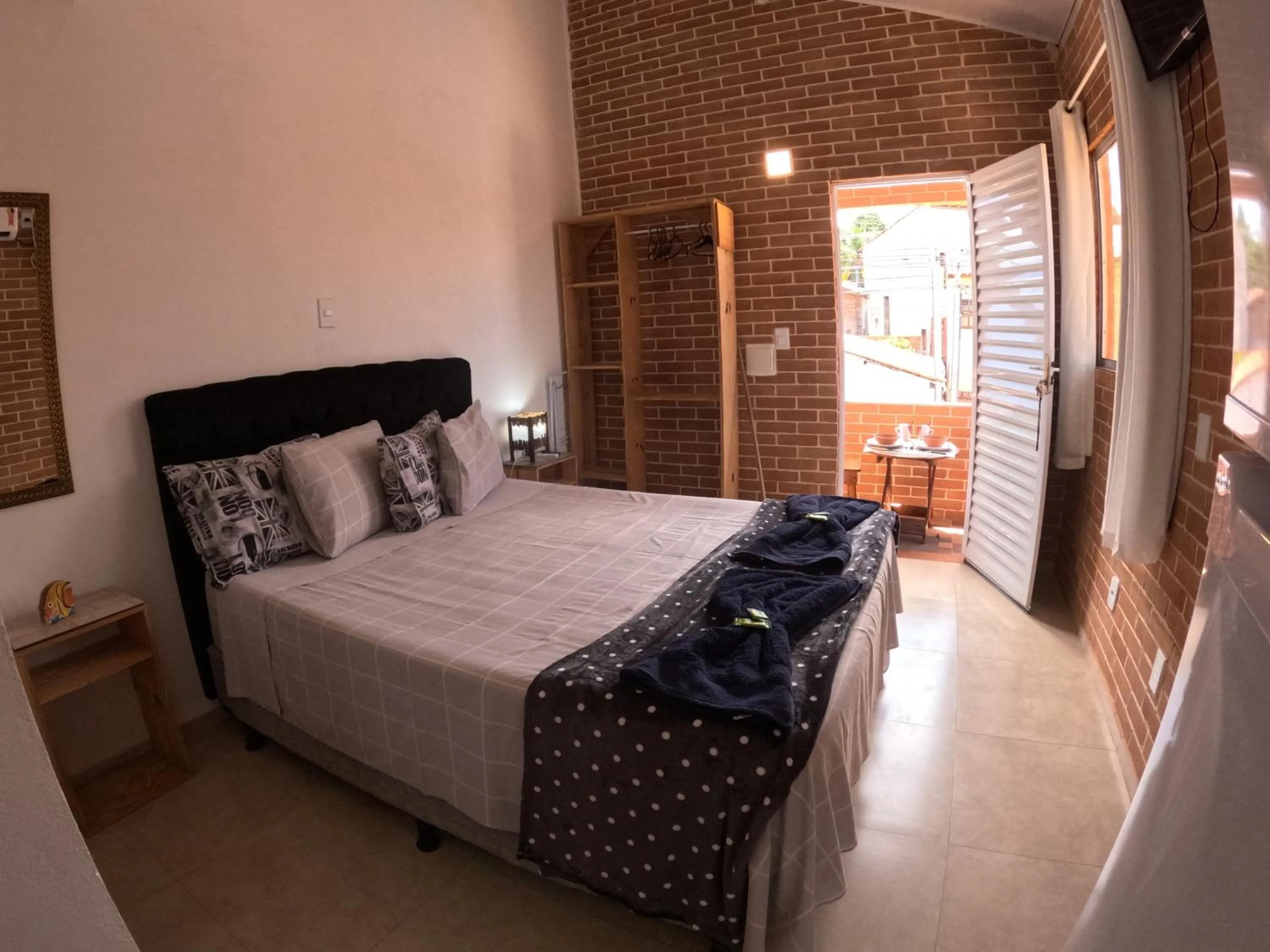 Bed in Paul's eco kitnets da praia & Nemo dive, centro de mergulho