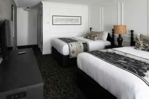 Bed in Cow Hollow Inn and Suites