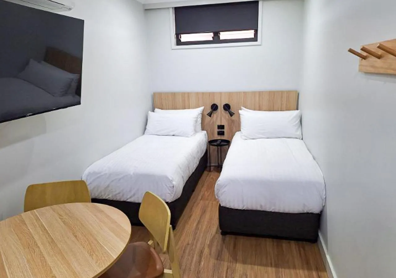Bed in Royal Hotel-Motel