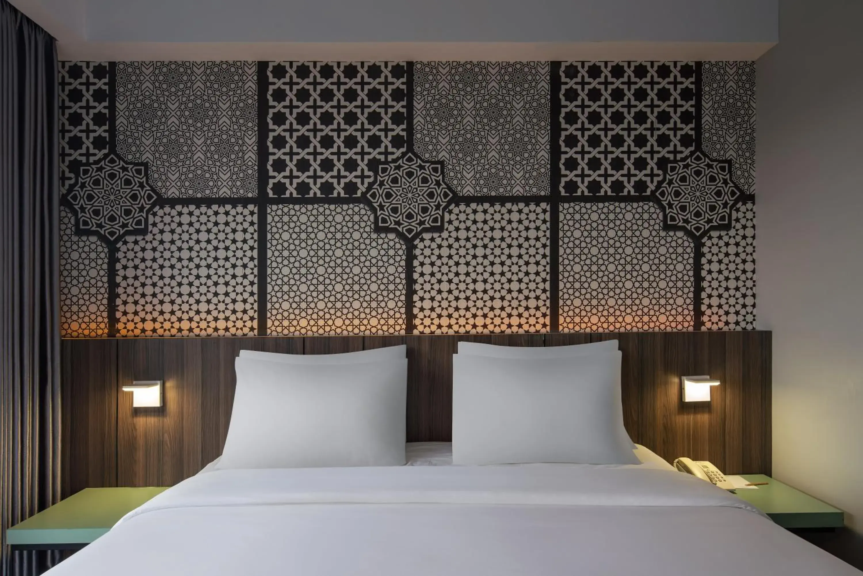 Bedroom, Bed in Unisi Hotel Malioboro - Jogja Syariah Bedroom, Bed in Unisi Hotel Malioboro - Jogja Syariah