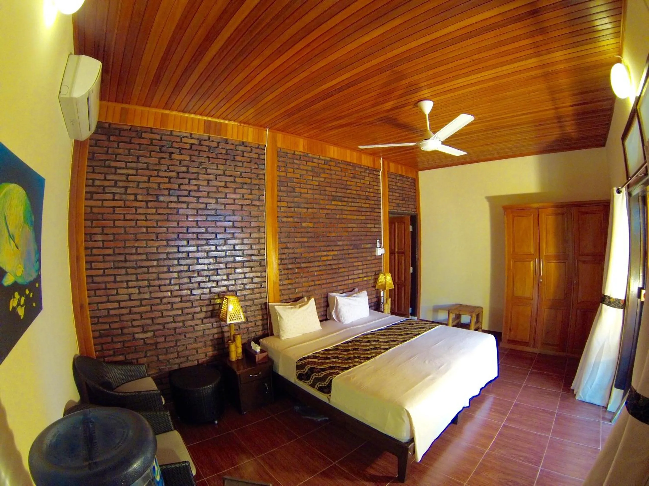 Bed in Lumbalumba Resort - Manado
