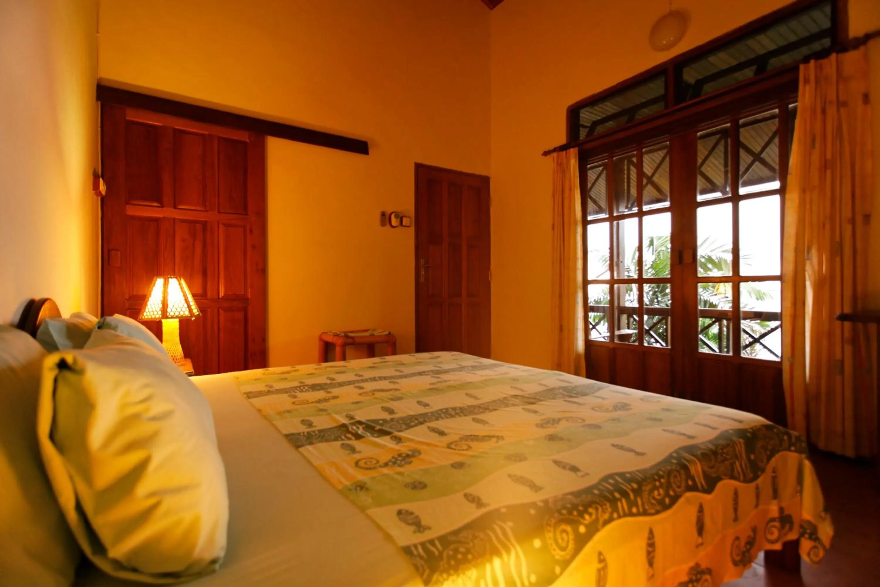 Bed in Lumbalumba Resort - Manado