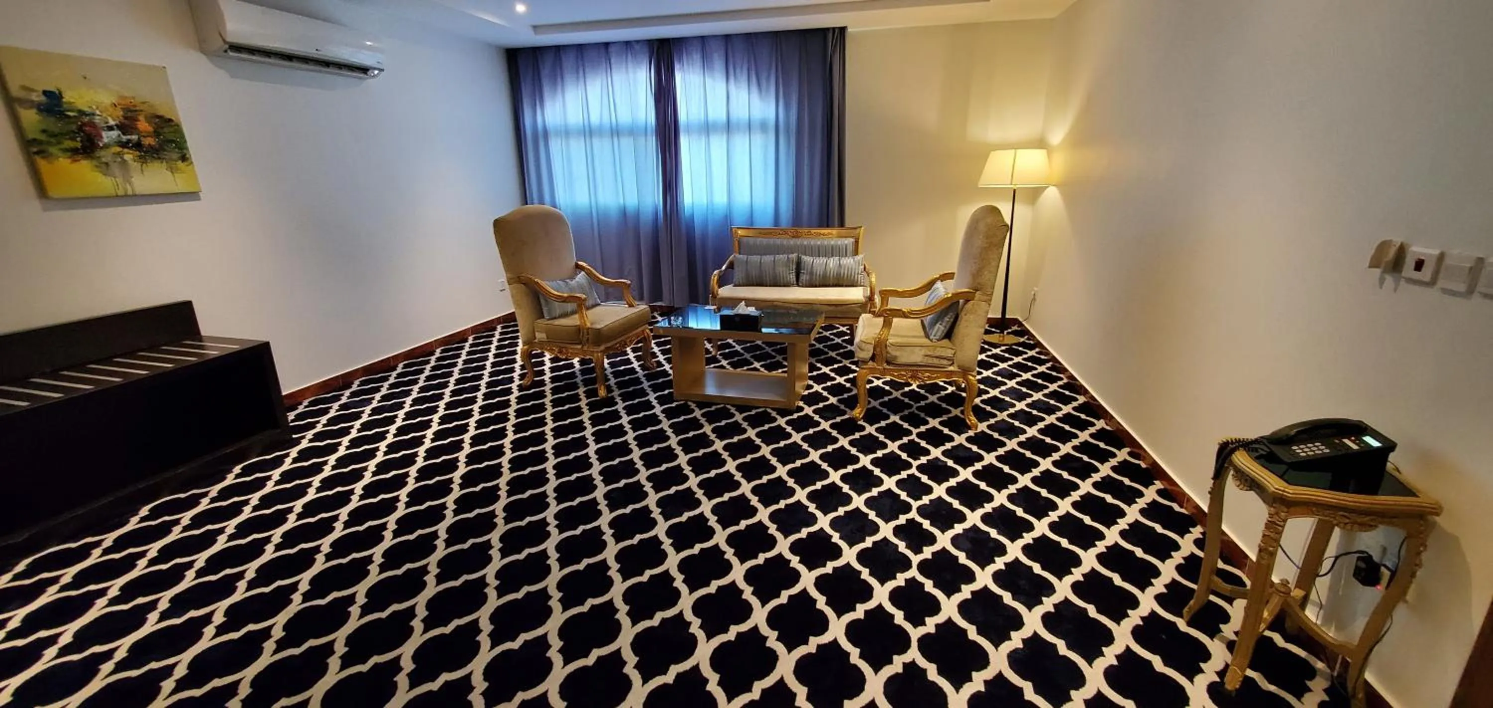 Seating area, Bed in Alazhar Palace Hotel