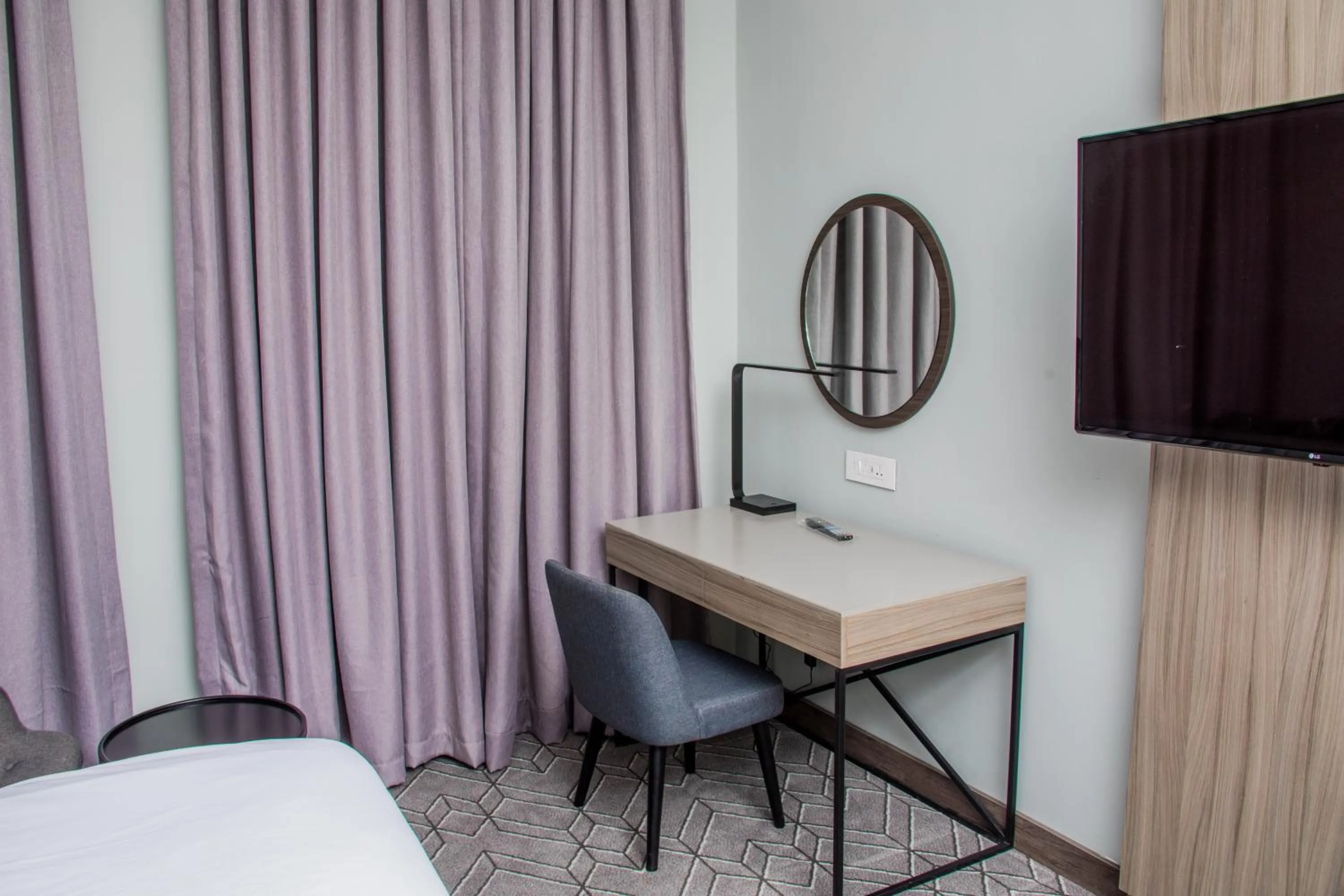 Seating area, Bed in Radisson Lagos Ikeja